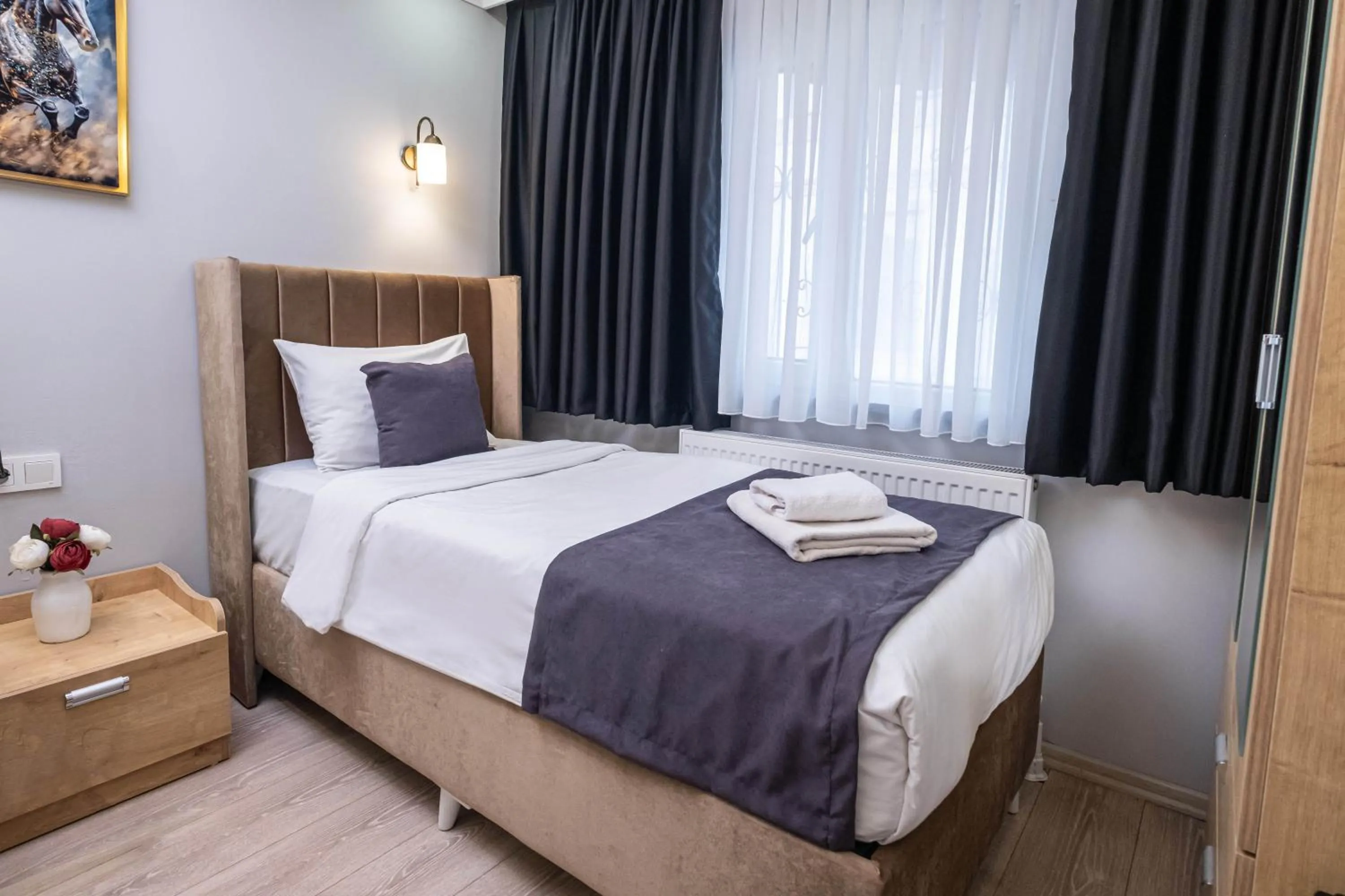 Bed in Family Istanbul Hotel