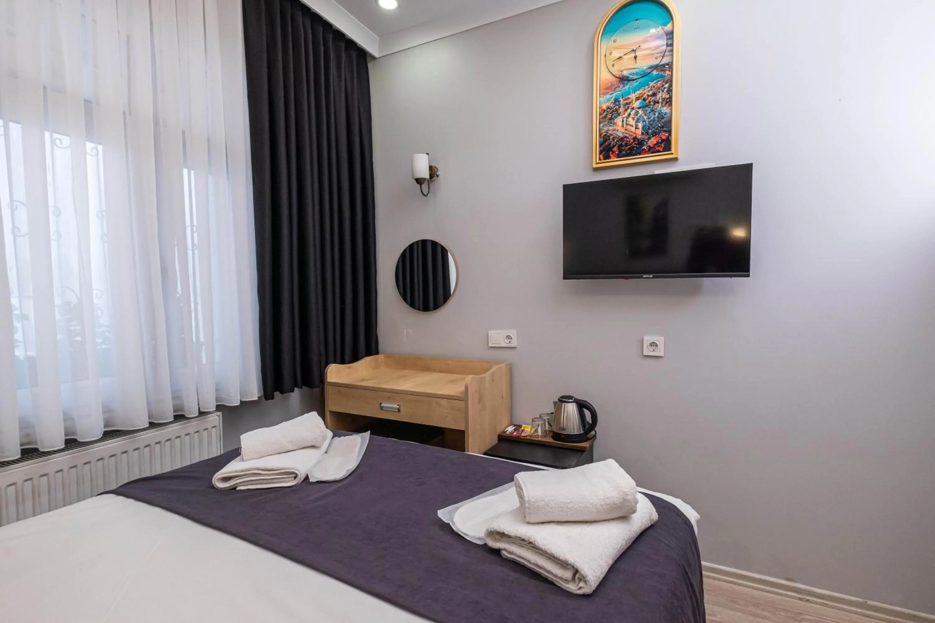 Bed in Family Istanbul Hotel