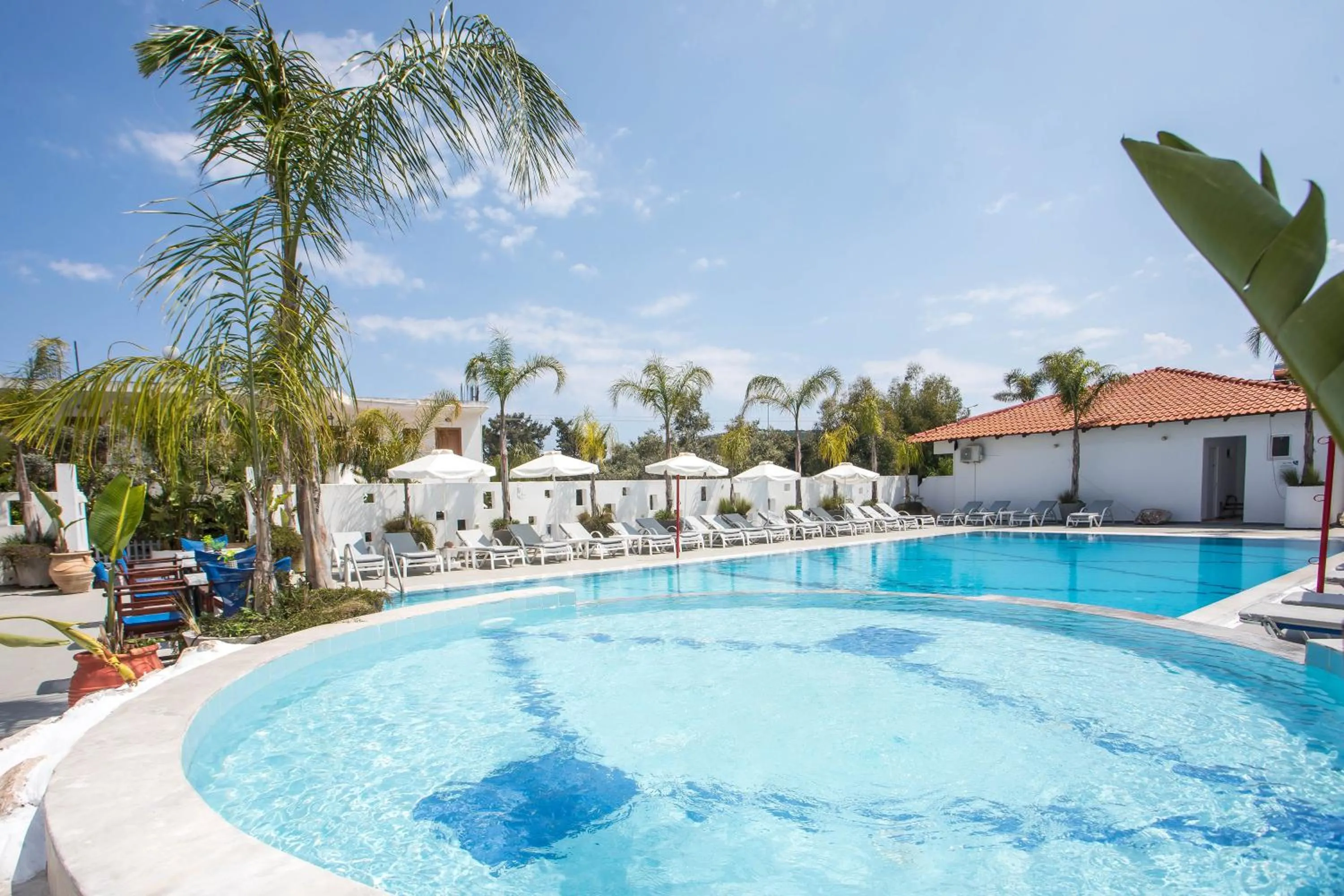 Swimming pool in Tinas Plus Hotel
