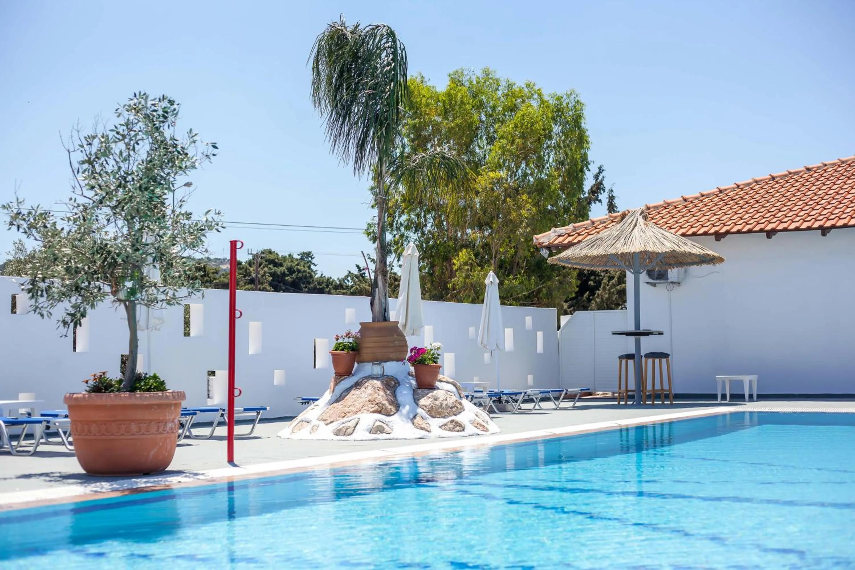 Swimming pool in Tinas Plus Hotel