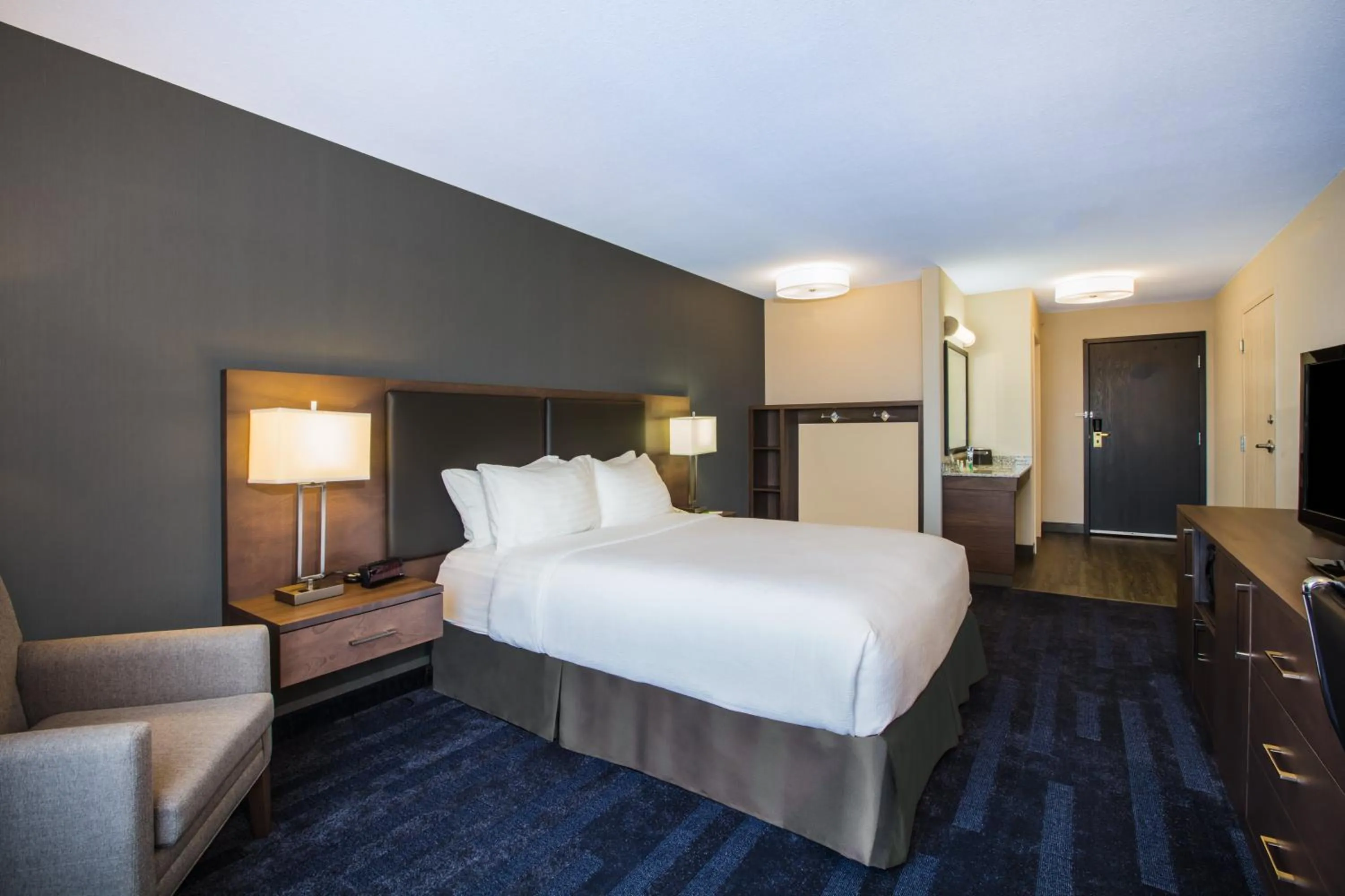 Photo of the whole room, Bed in Holiday Inn & Suites Grande Prairie by IHG