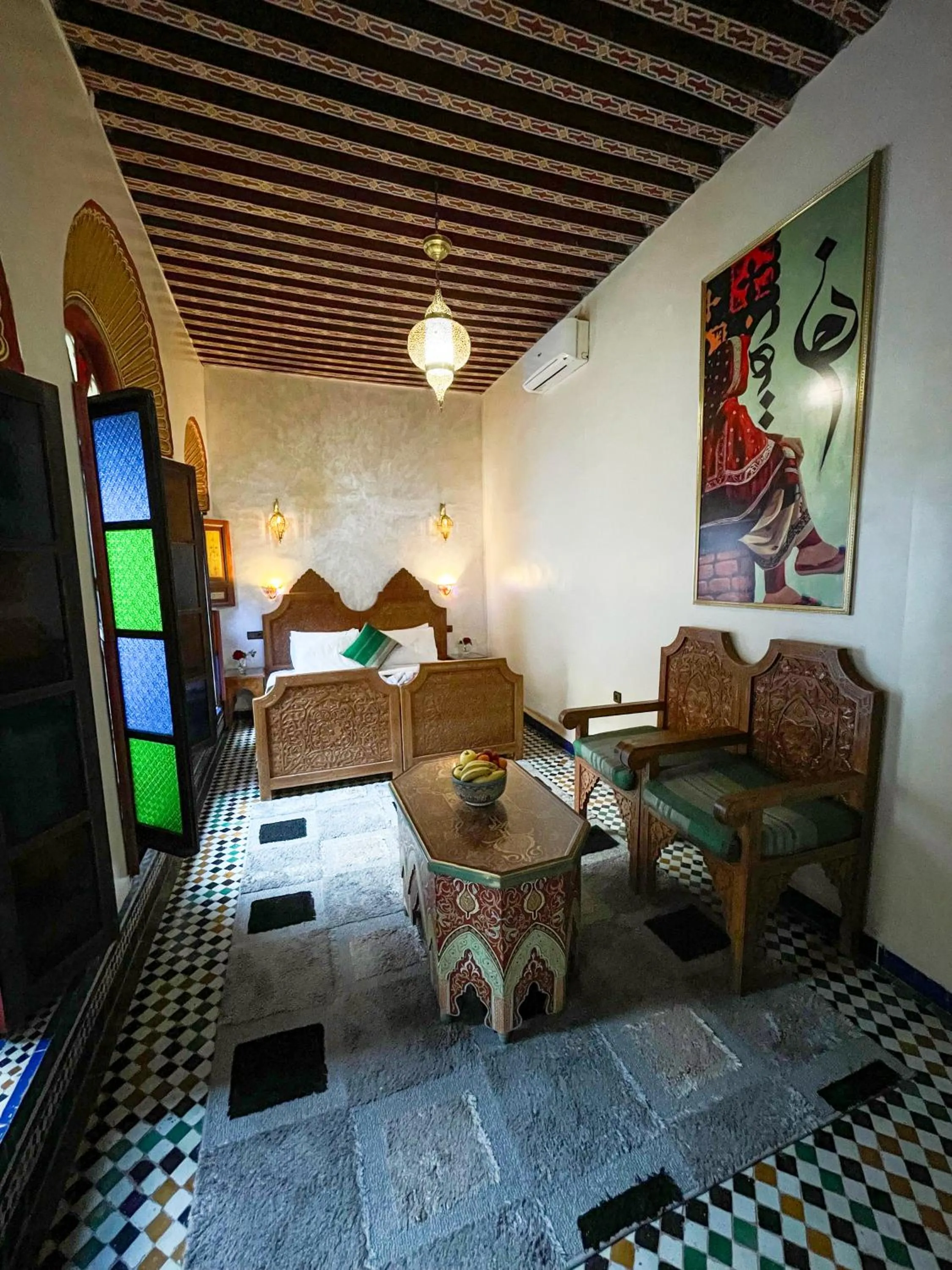 Bed in Riad Dar El Ouedghiri