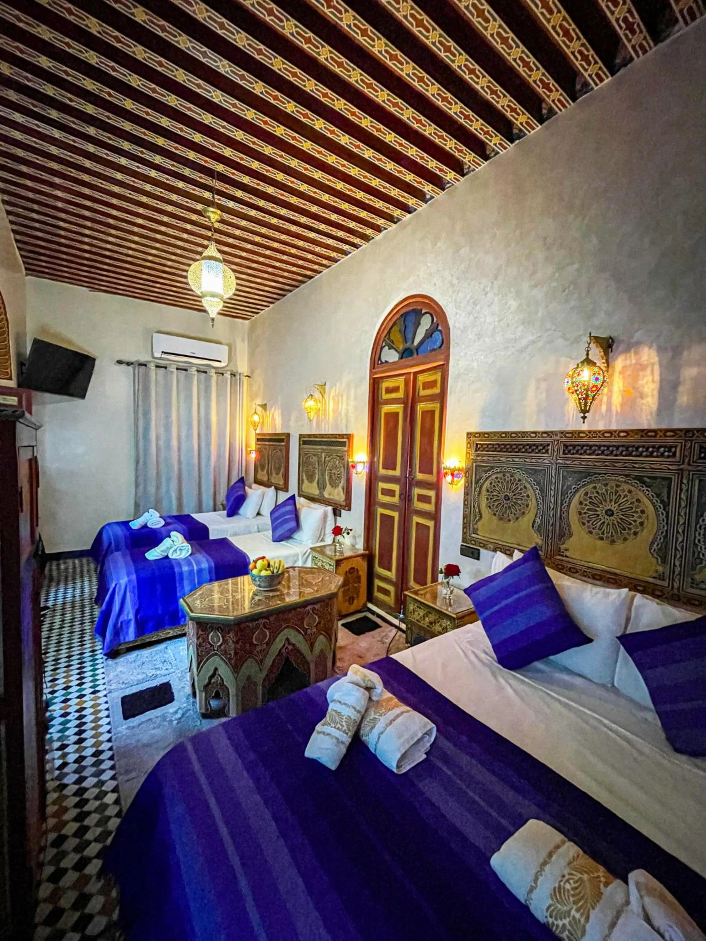 Bed in Riad Dar El Ouedghiri