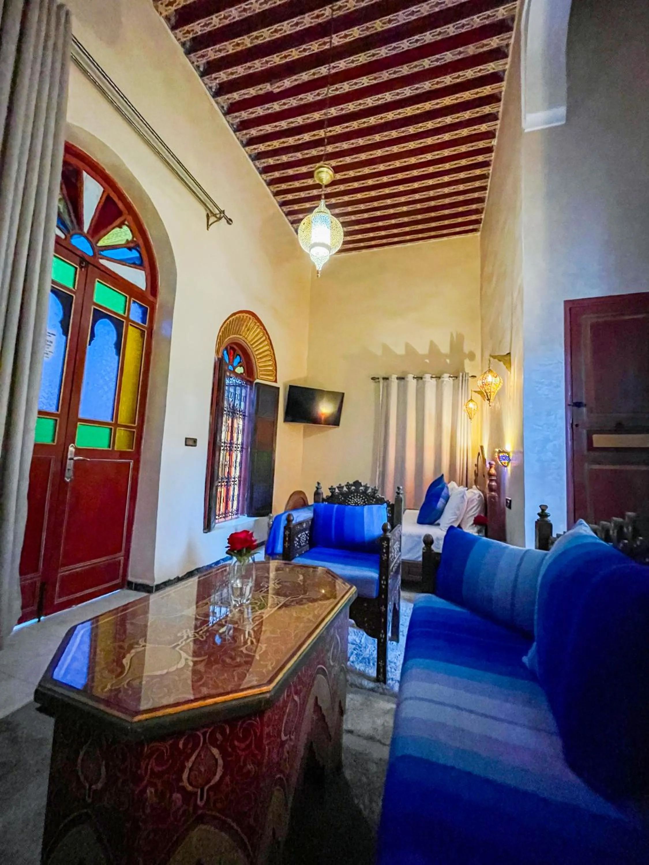 Communal lounge/ TV room in Riad Dar El Ouedghiri