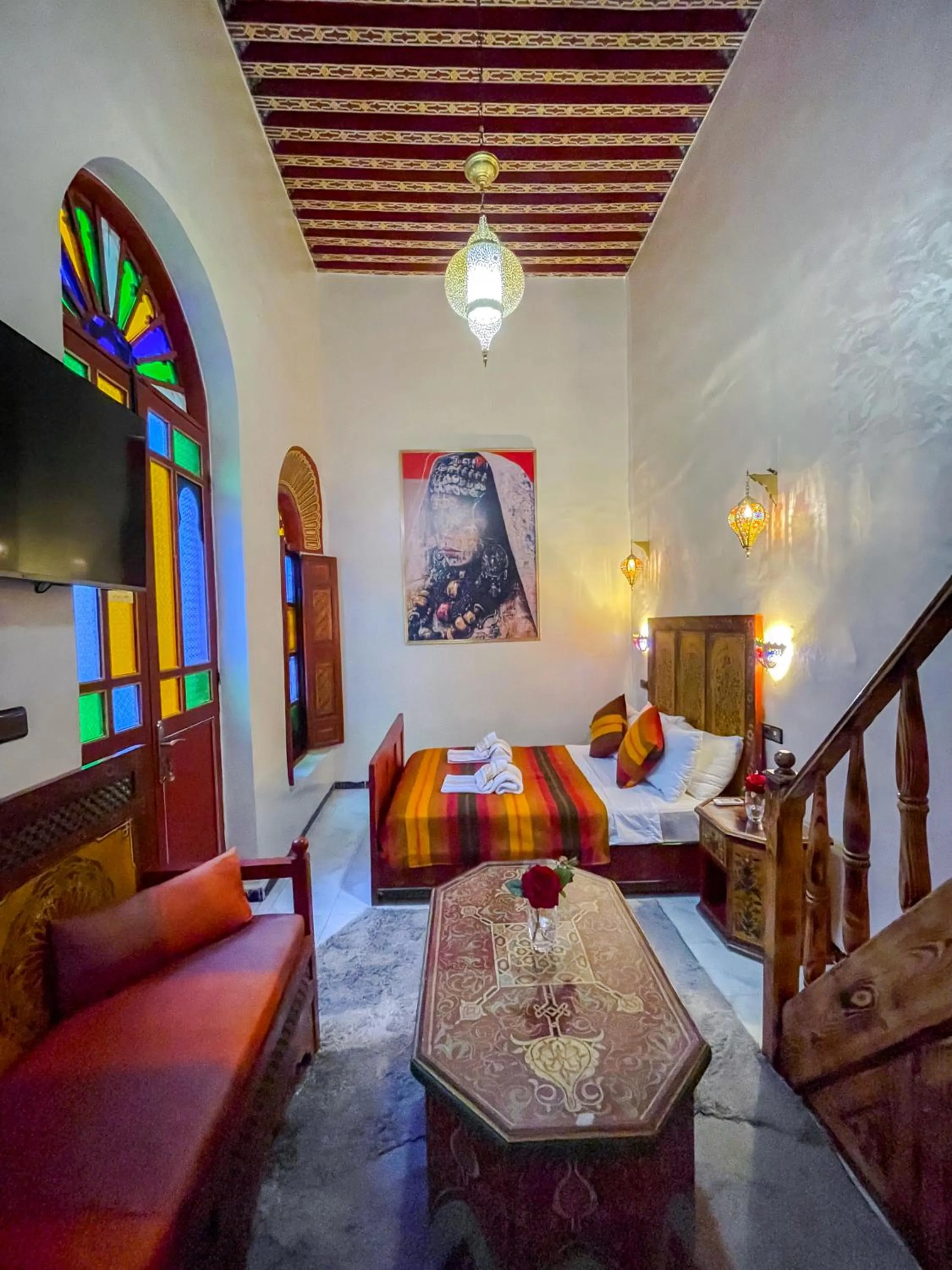 Communal lounge/ TV room, Bed in Riad Dar El Ouedghiri