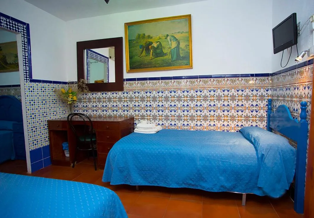 Bed in Pensión Santa María la Blanca