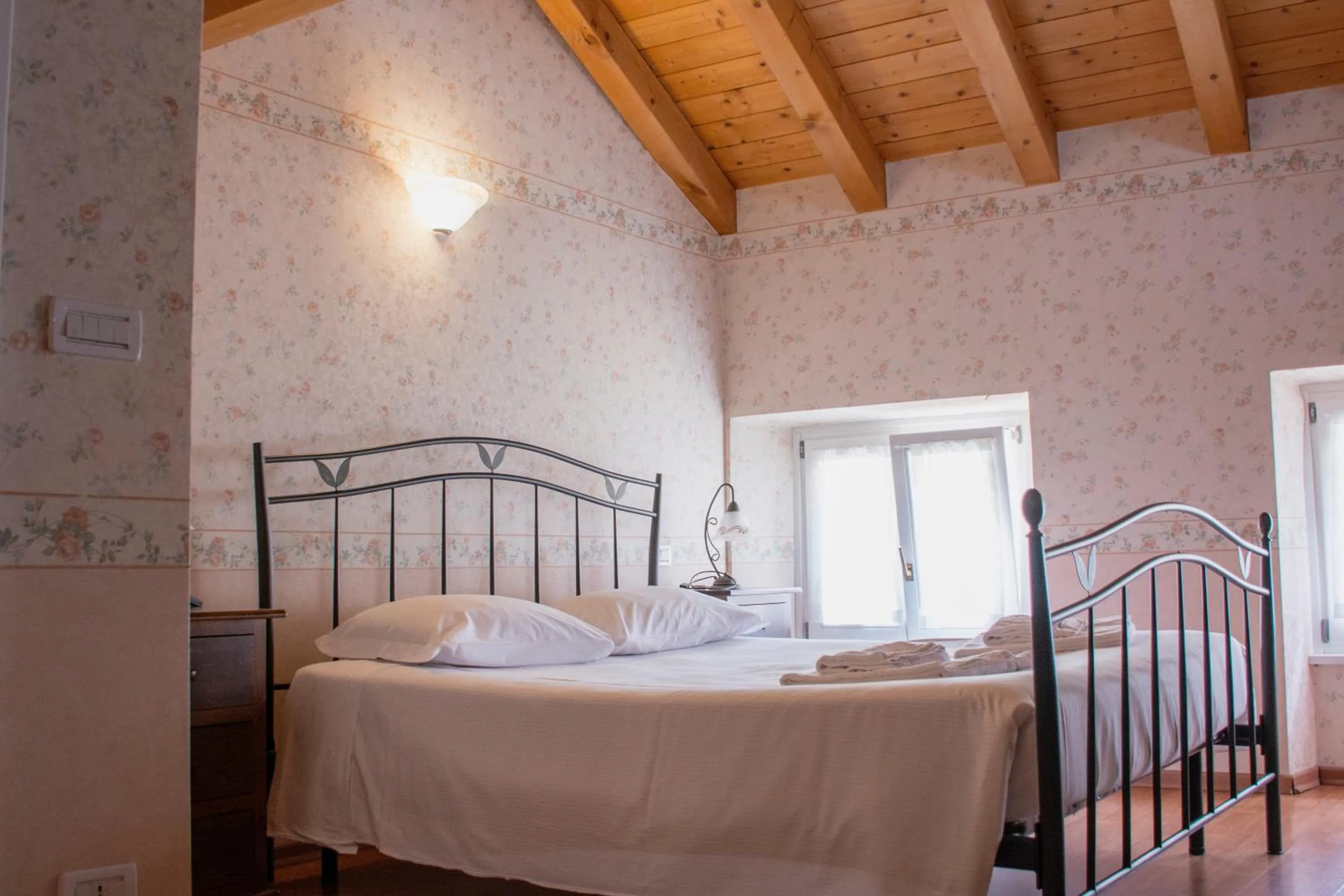 Bed in Hotel Capitelli