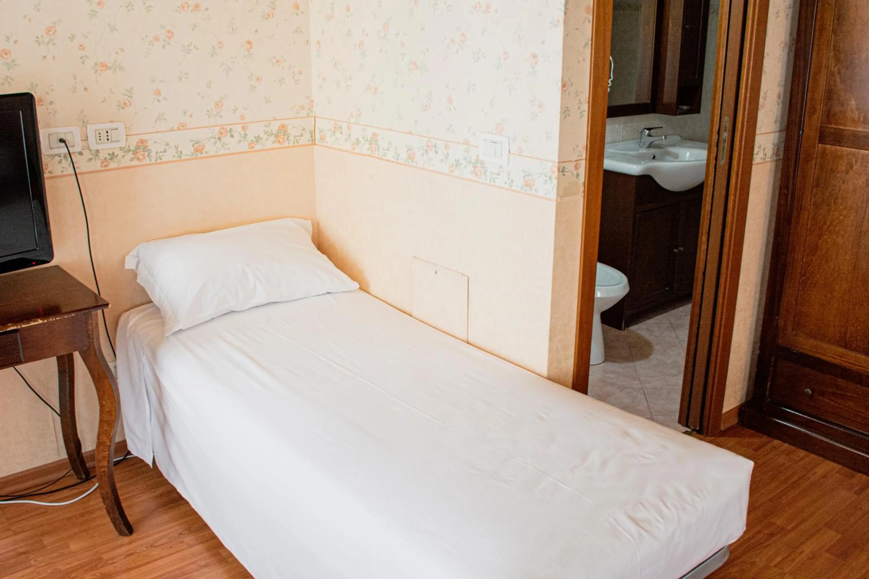 Bed in Hotel Capitelli