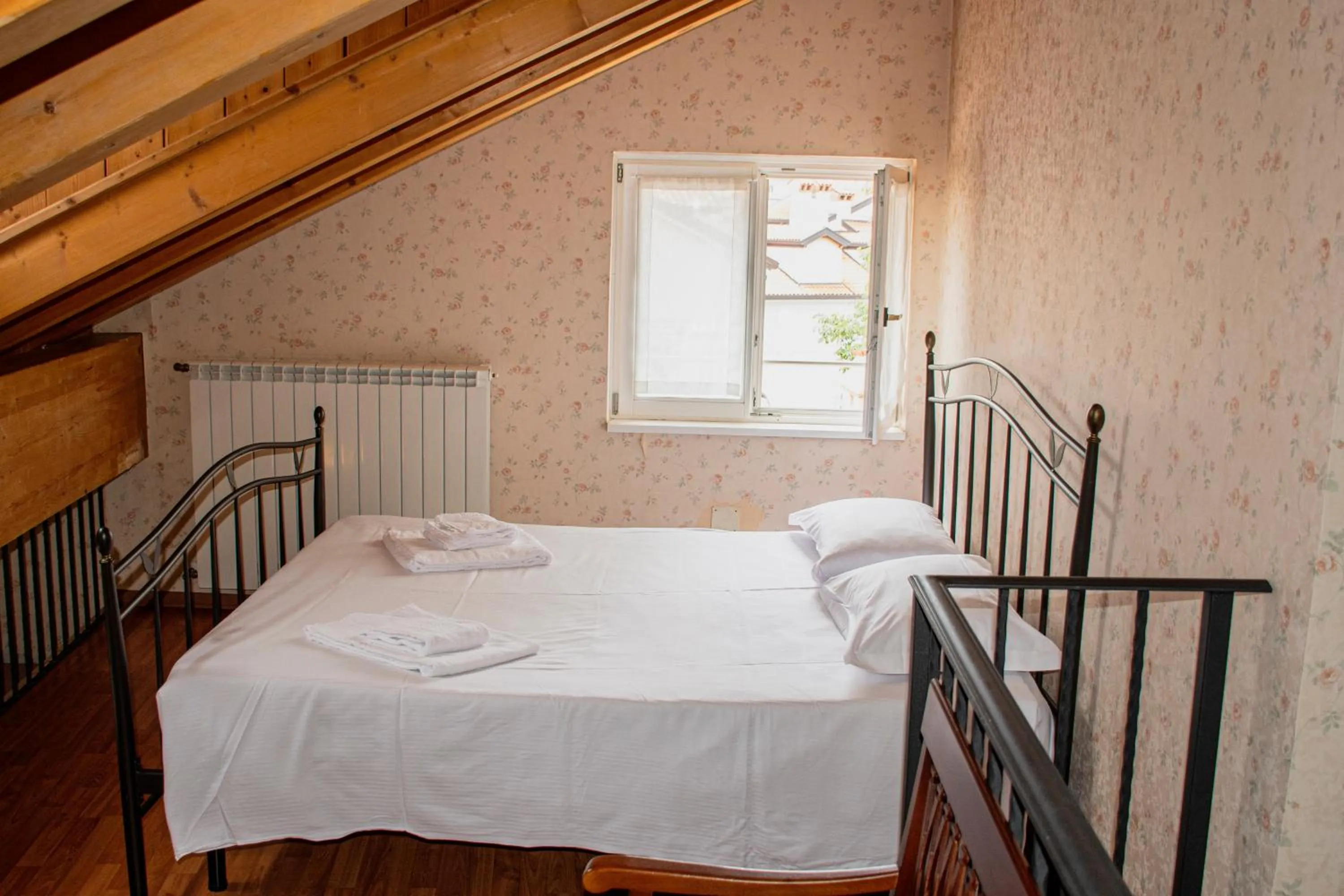 Bed in Hotel Capitelli