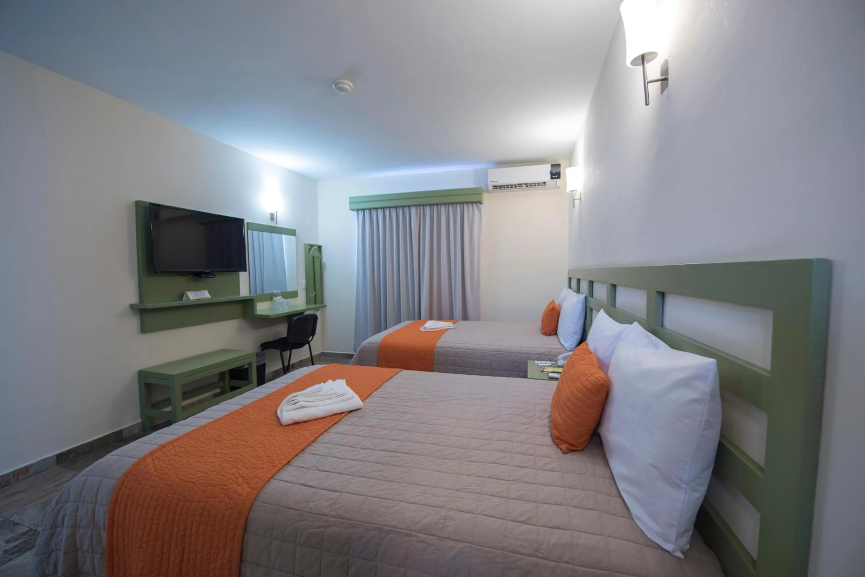 Bed in Hotel Palace Inn