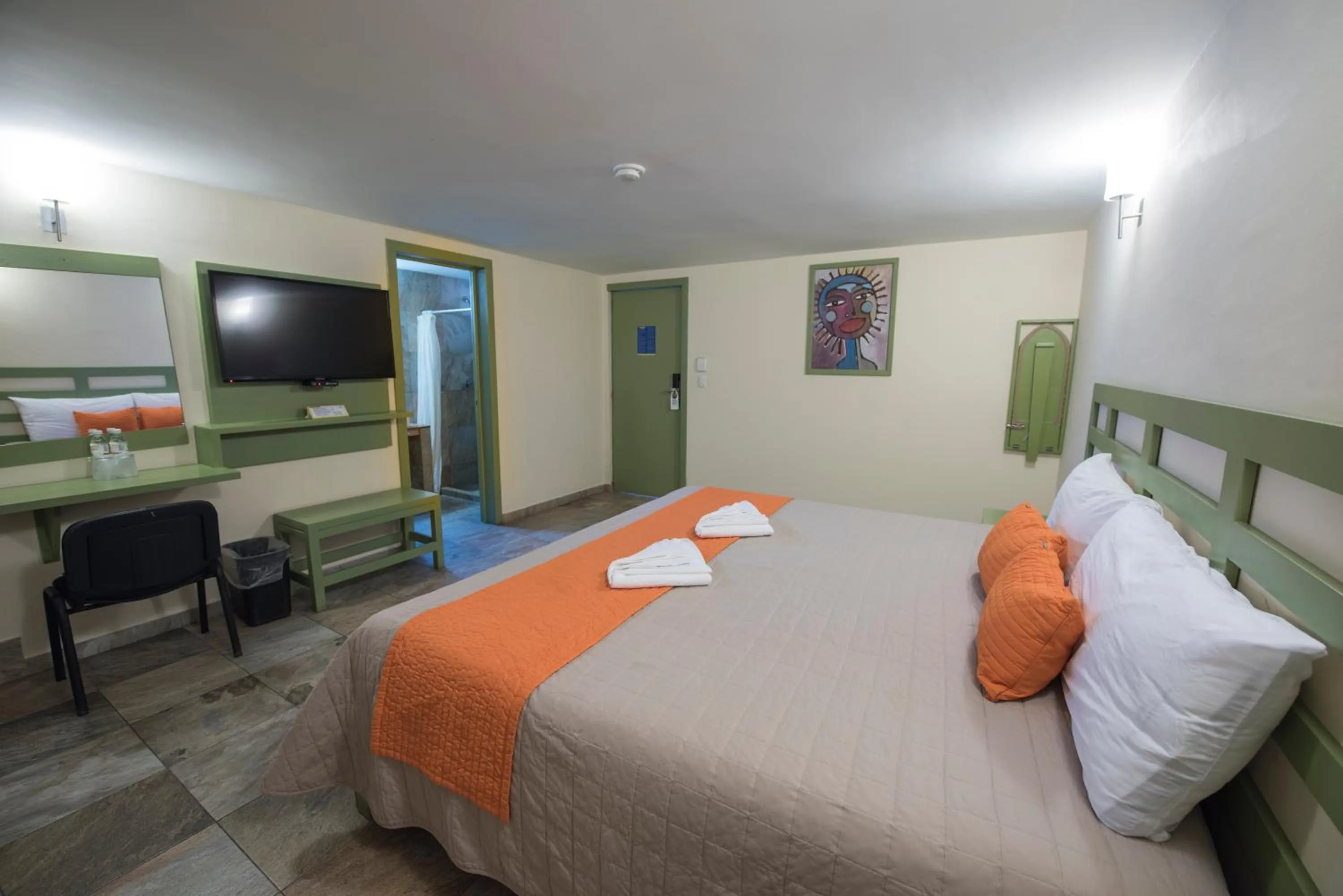 Bed in Hotel Palace Inn