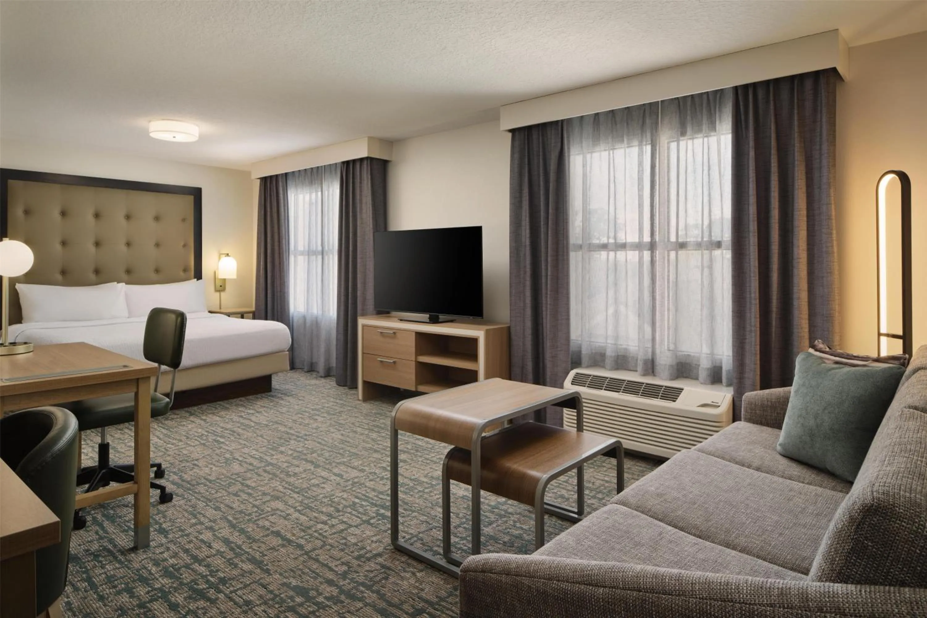 Living room, Bed in Homewood Suites by Hilton Daytona Beach Speedway-Airport