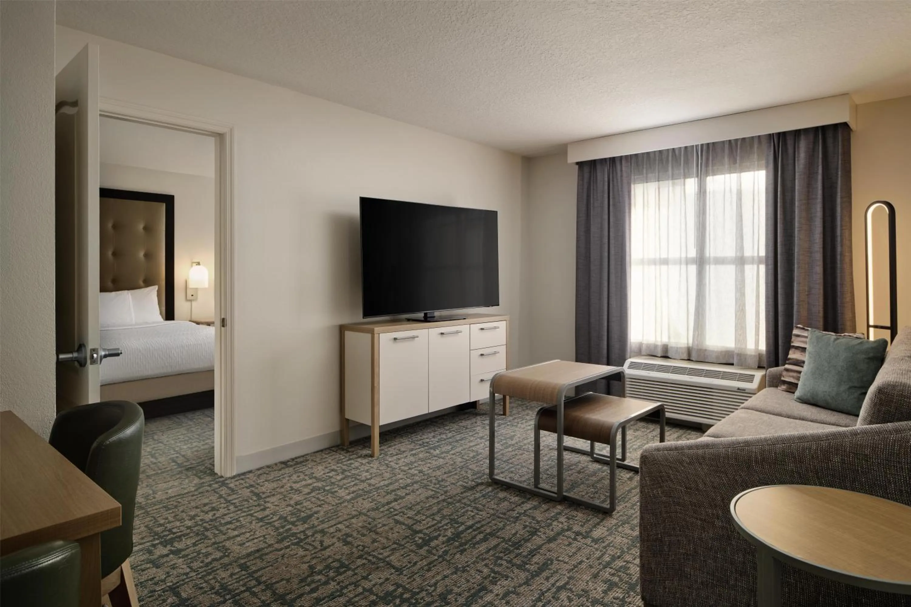 Living room, Bed in Homewood Suites by Hilton Daytona Beach Speedway-Airport