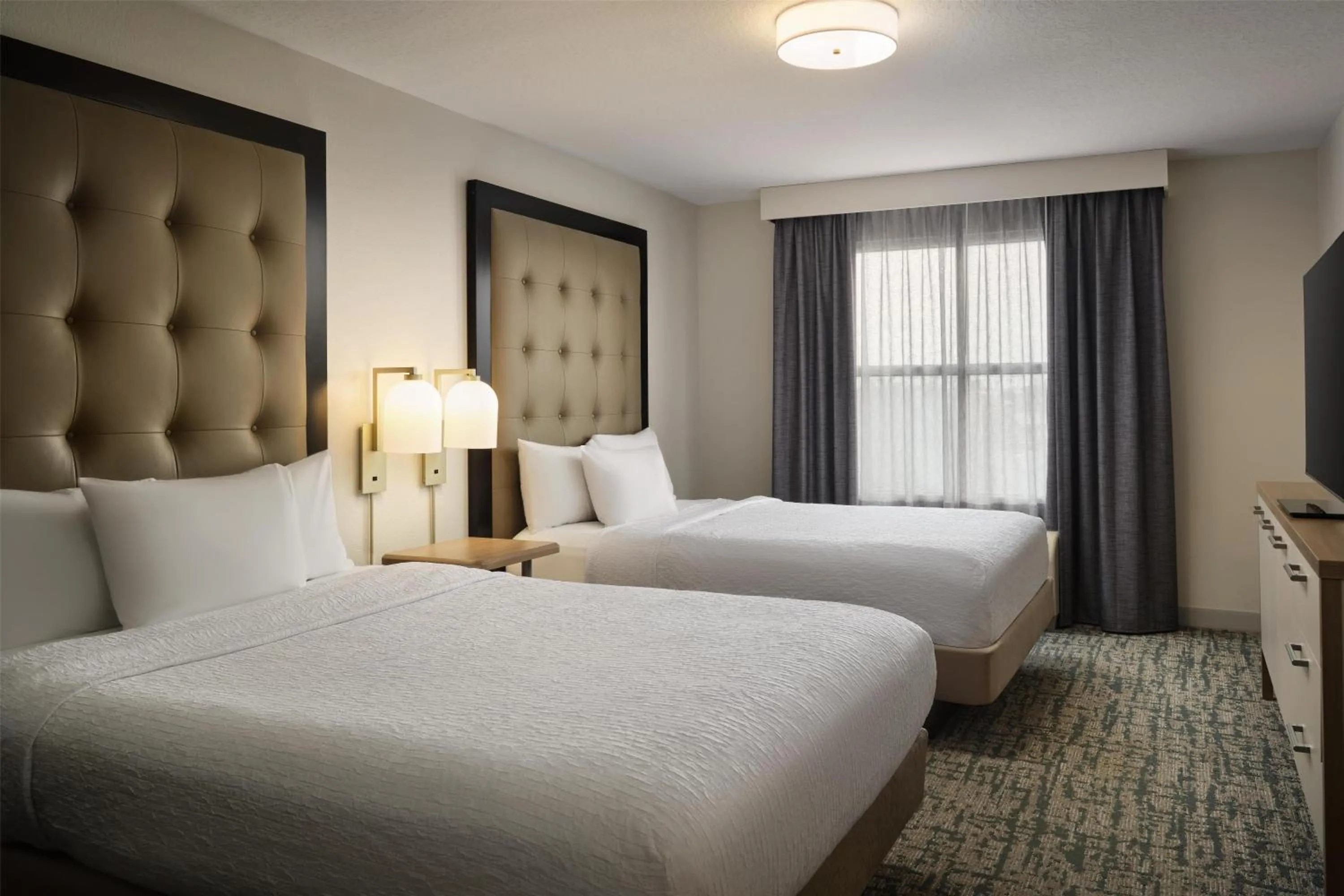 Bed in Homewood Suites by Hilton Daytona Beach Speedway-Airport