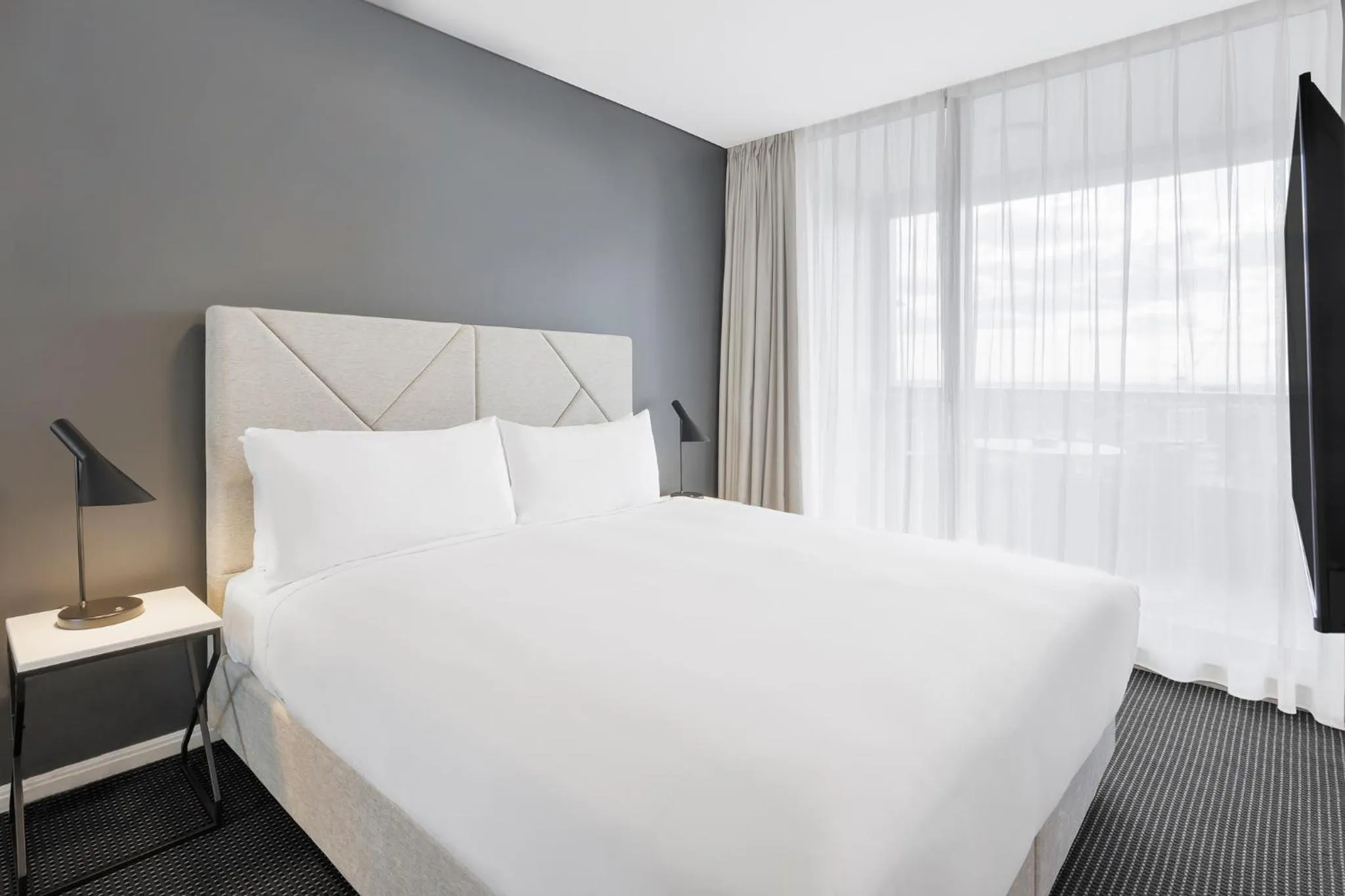 Bed in Meriton Suites Zetland