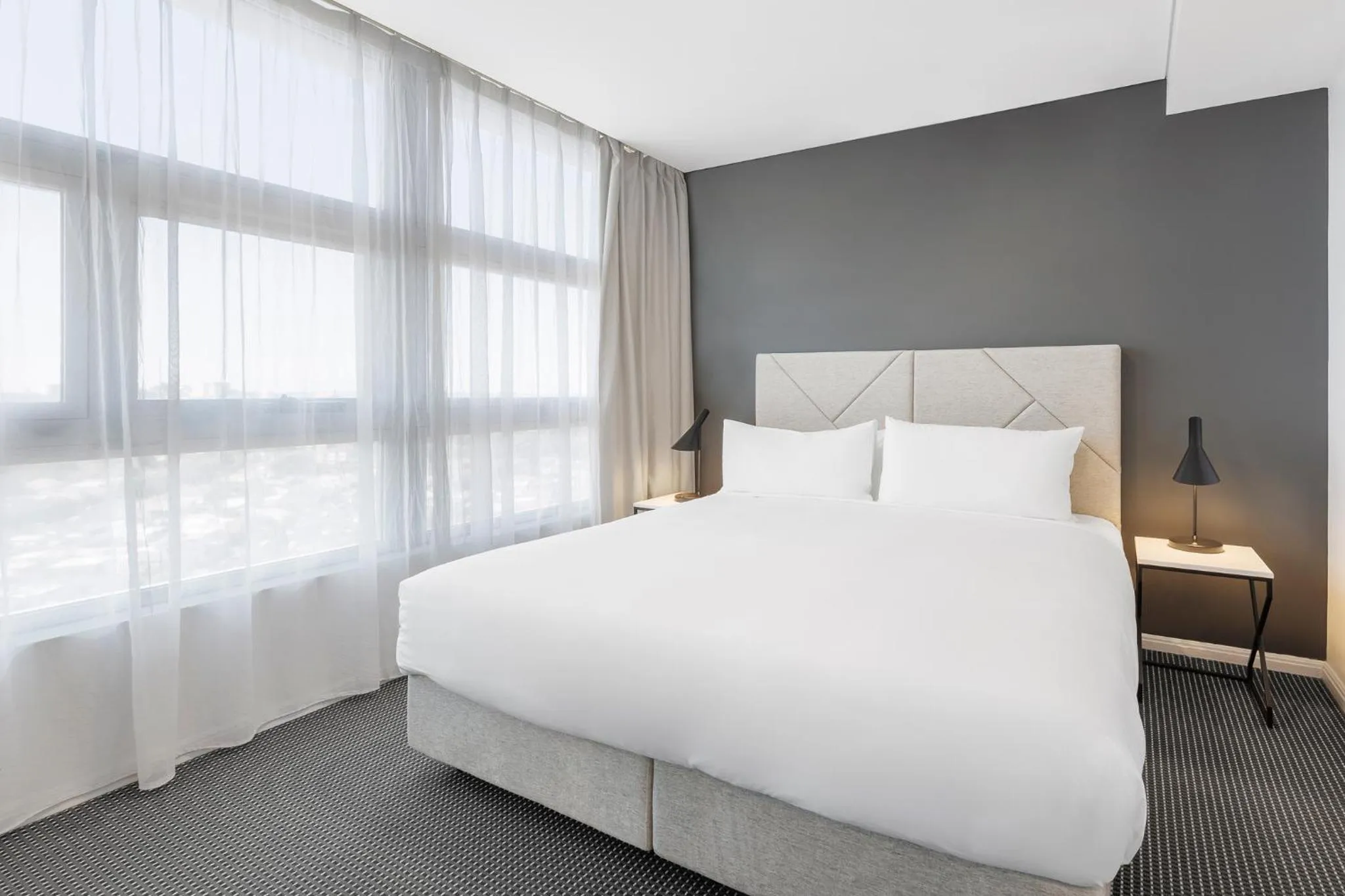 Bed in Meriton Suites Zetland
