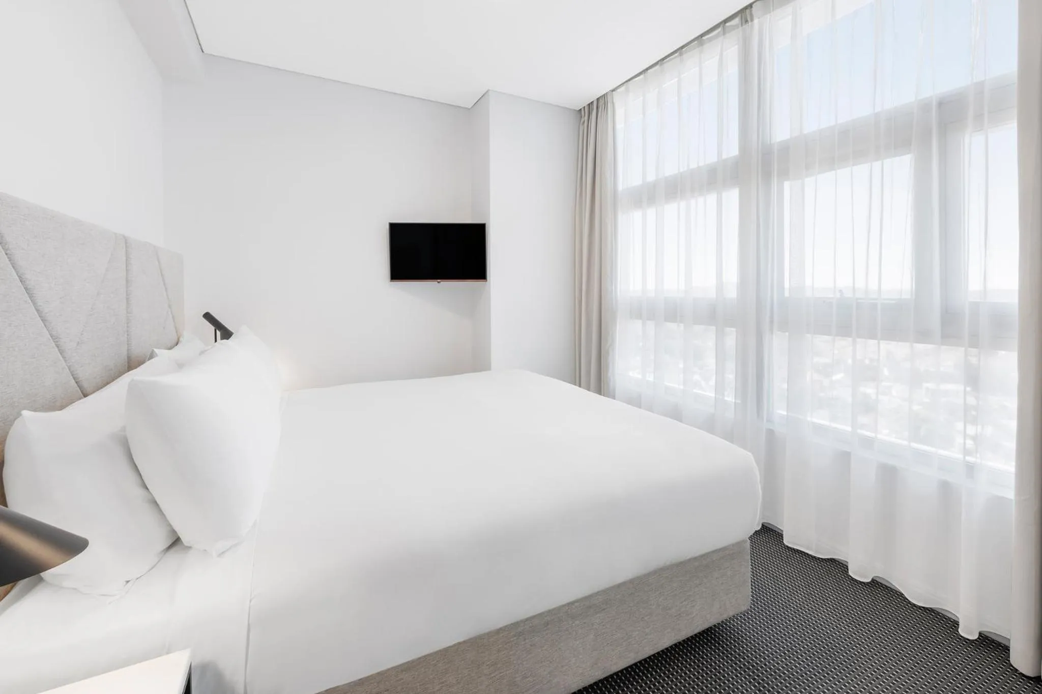 Bed in Meriton Suites Zetland