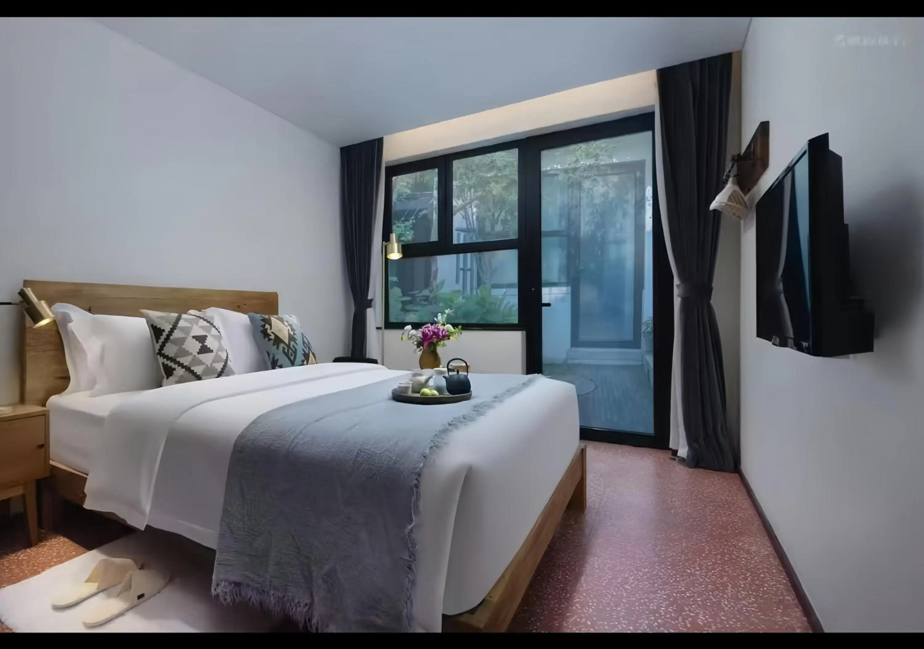 Bed in Peking Yard Boutique Hotel