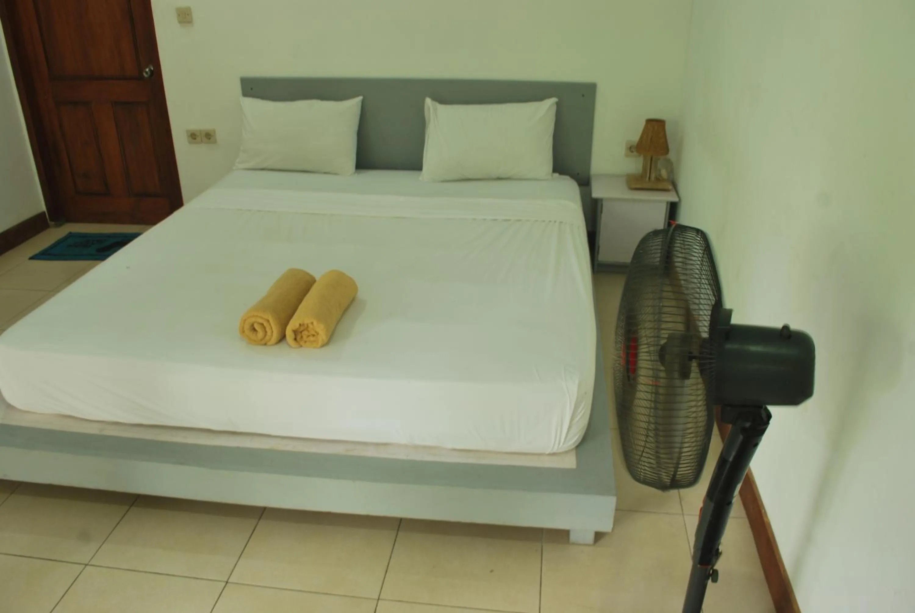 Bed in Gili Smile Bungalow