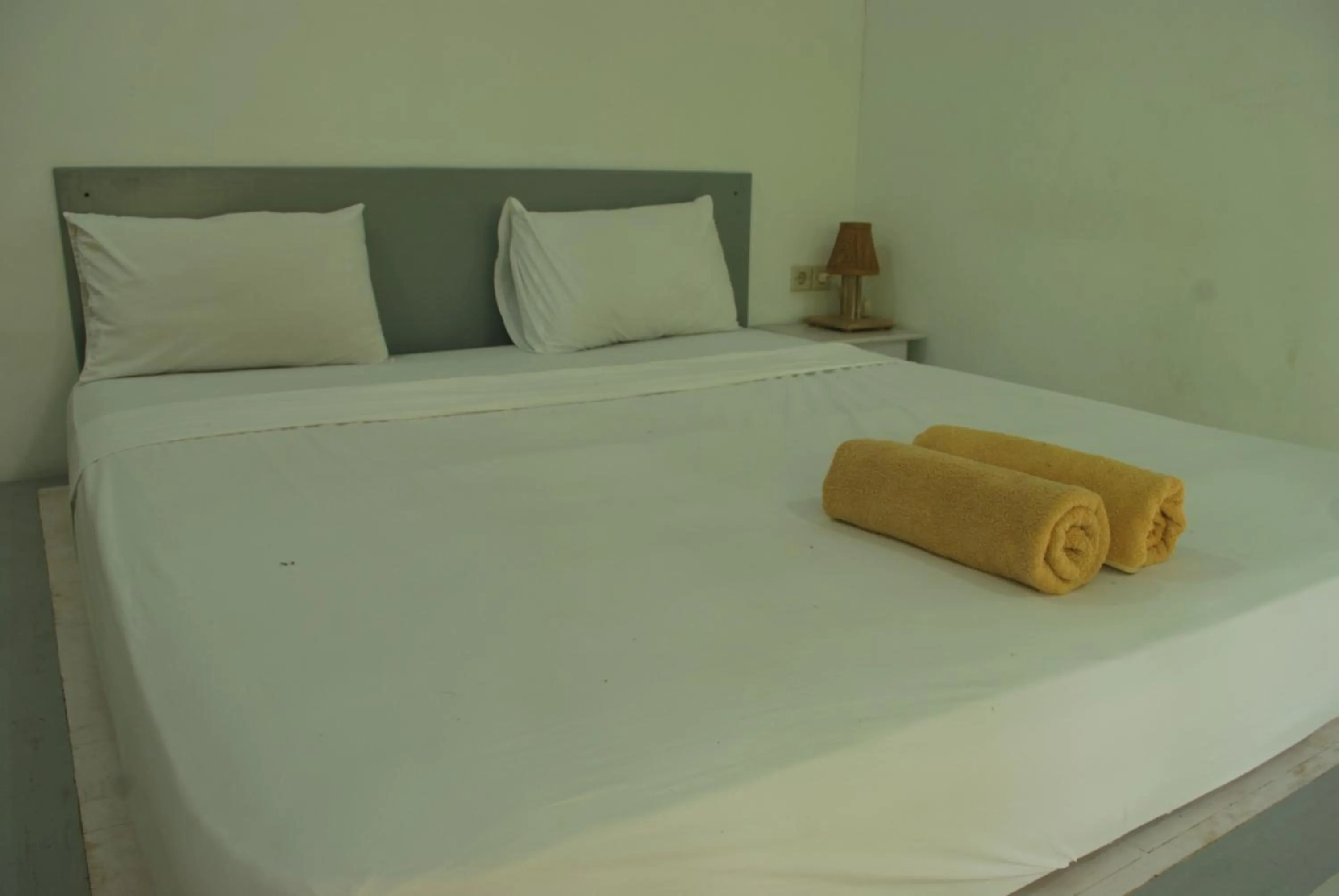 Bed in Gili Smile Bungalow