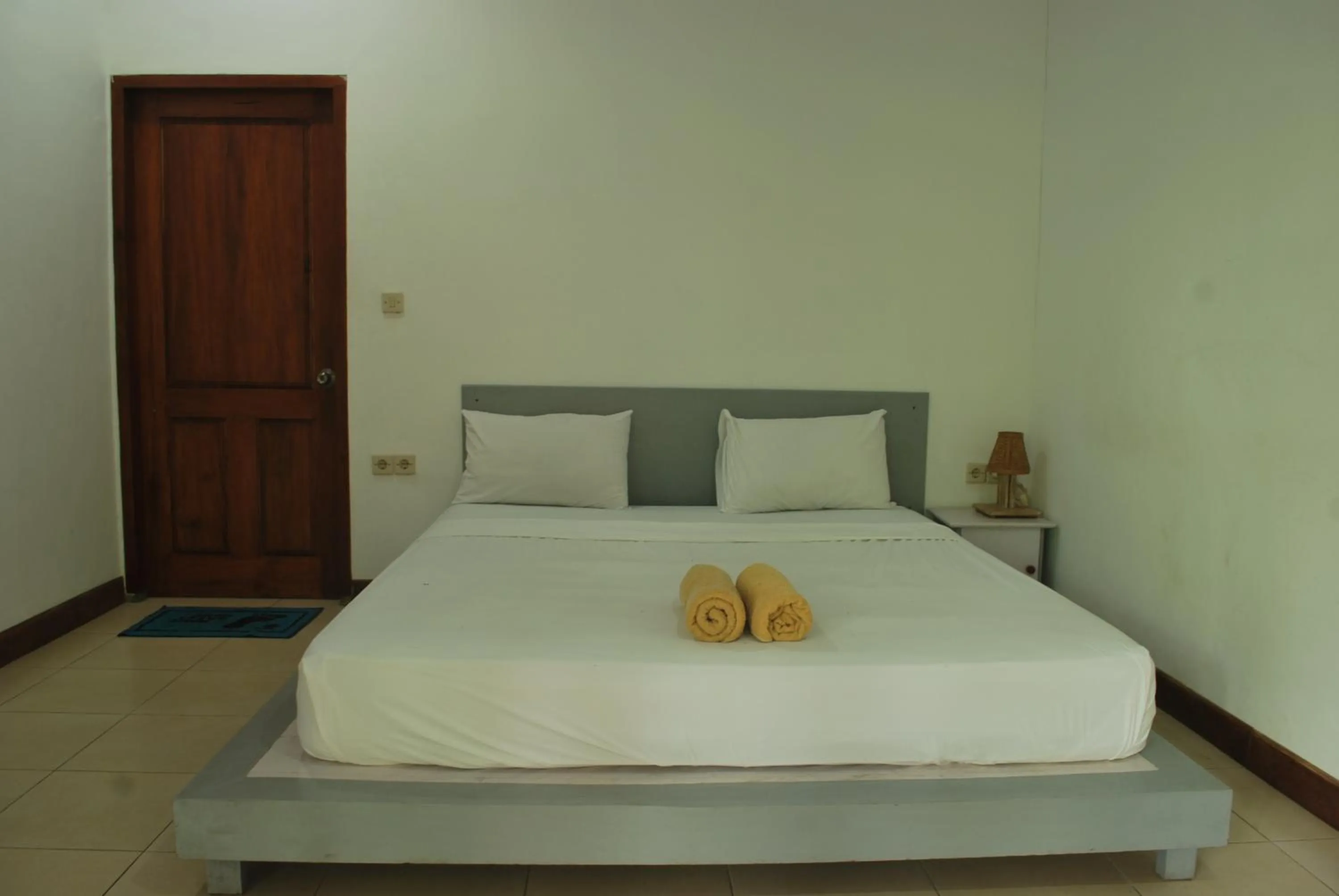 Bed in Gili Smile Bungalow