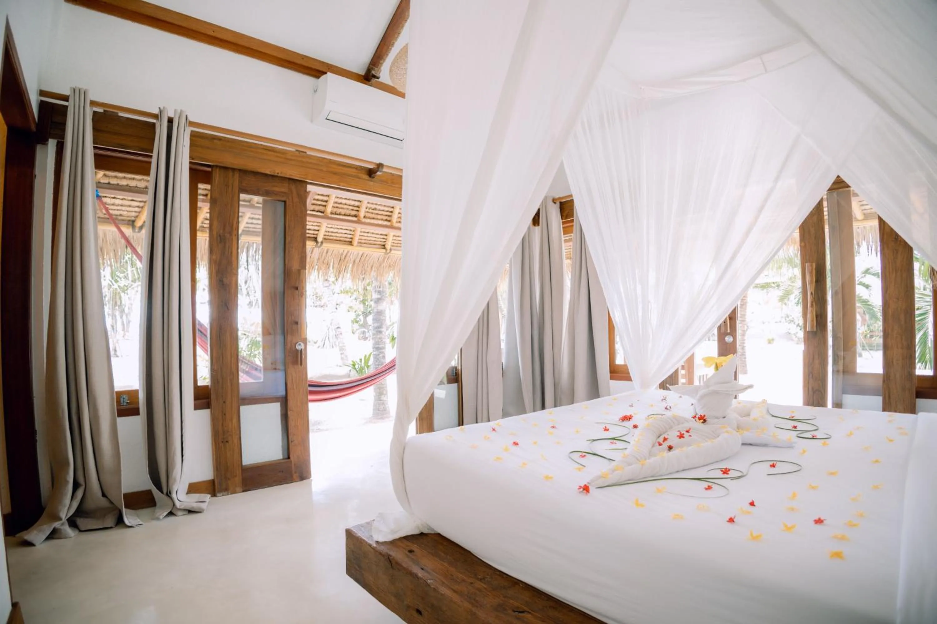 Bed in Island View Bar & Bungalow