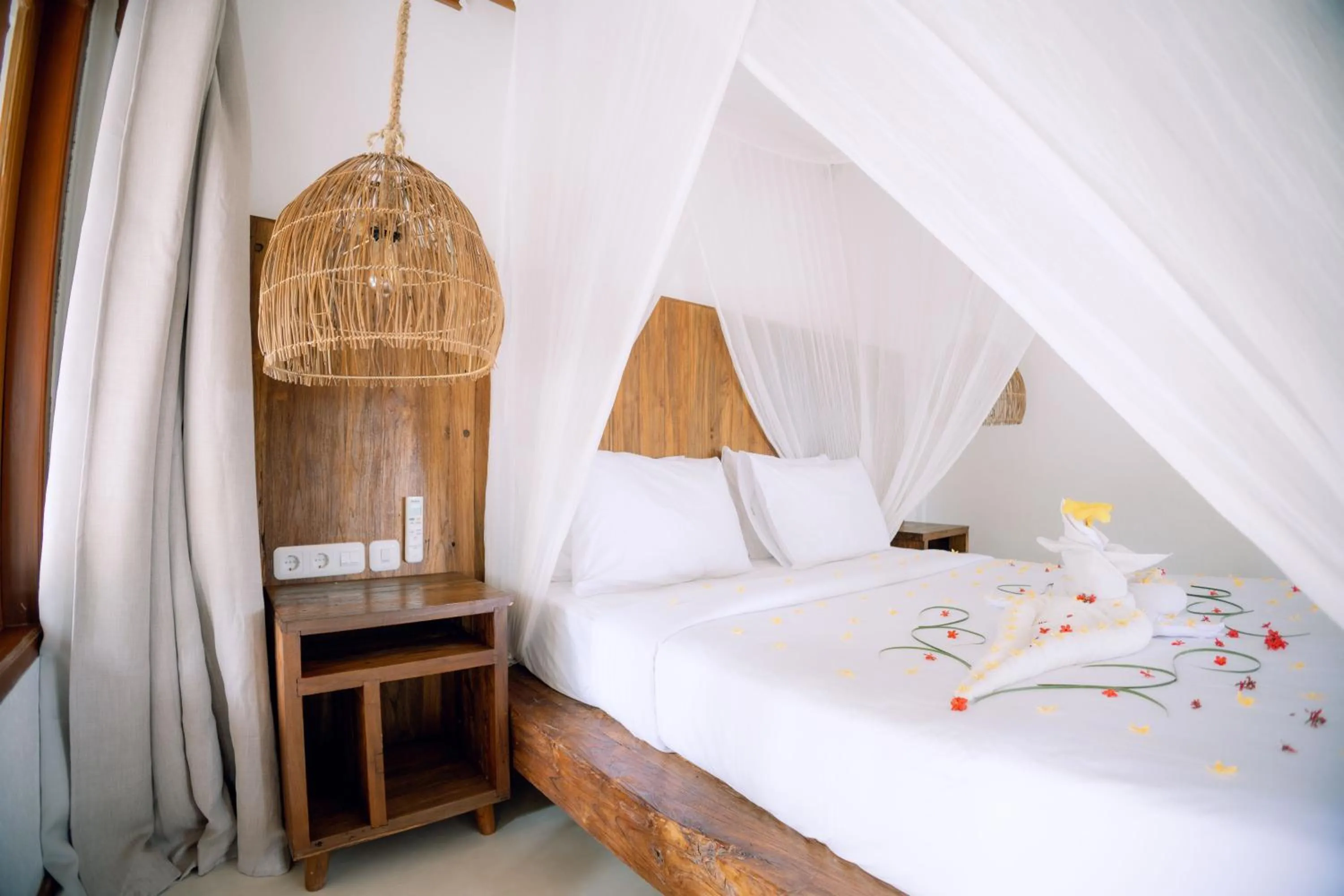 Bed in Island View Bar & Bungalow