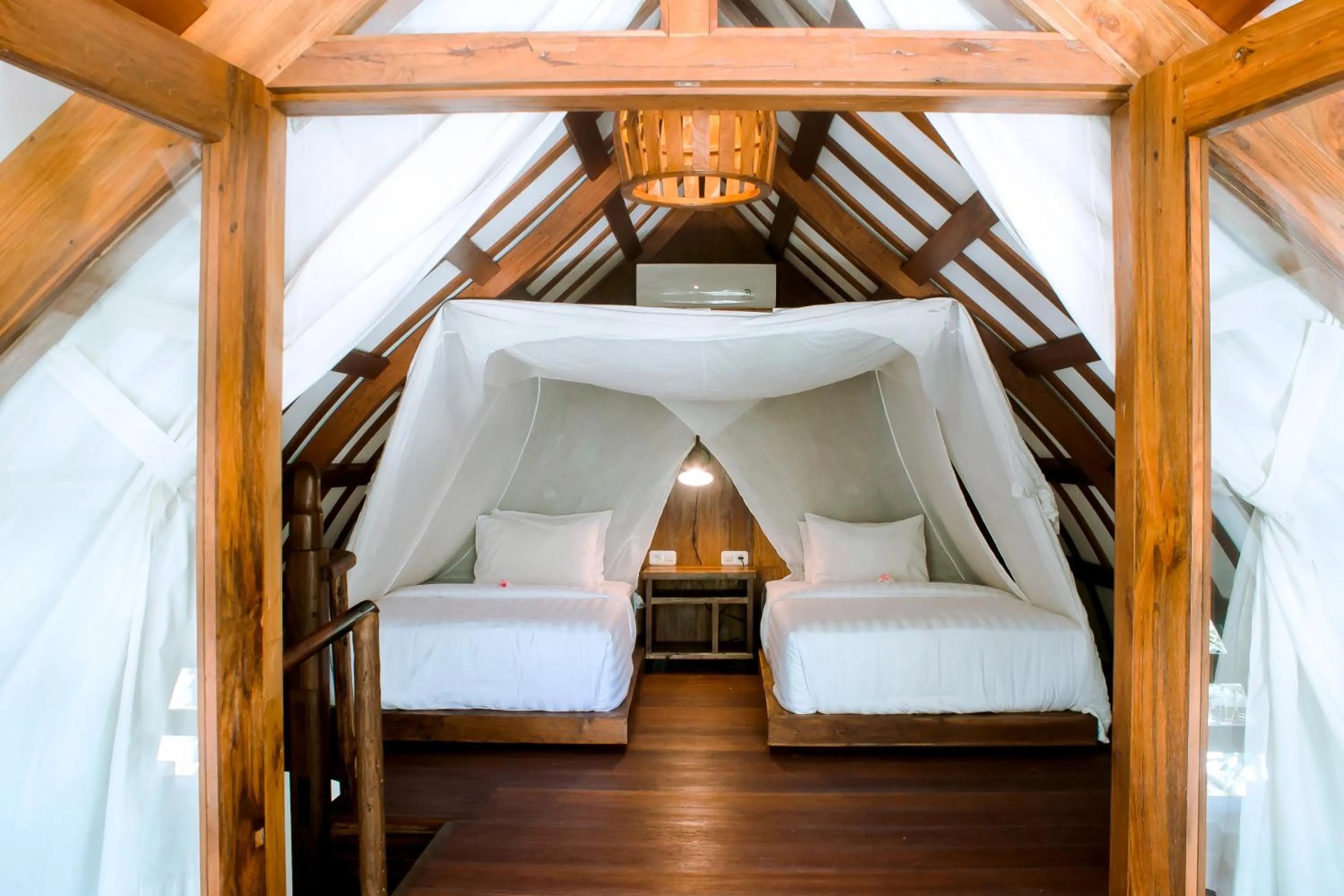 Bed in Island View Bar & Bungalow