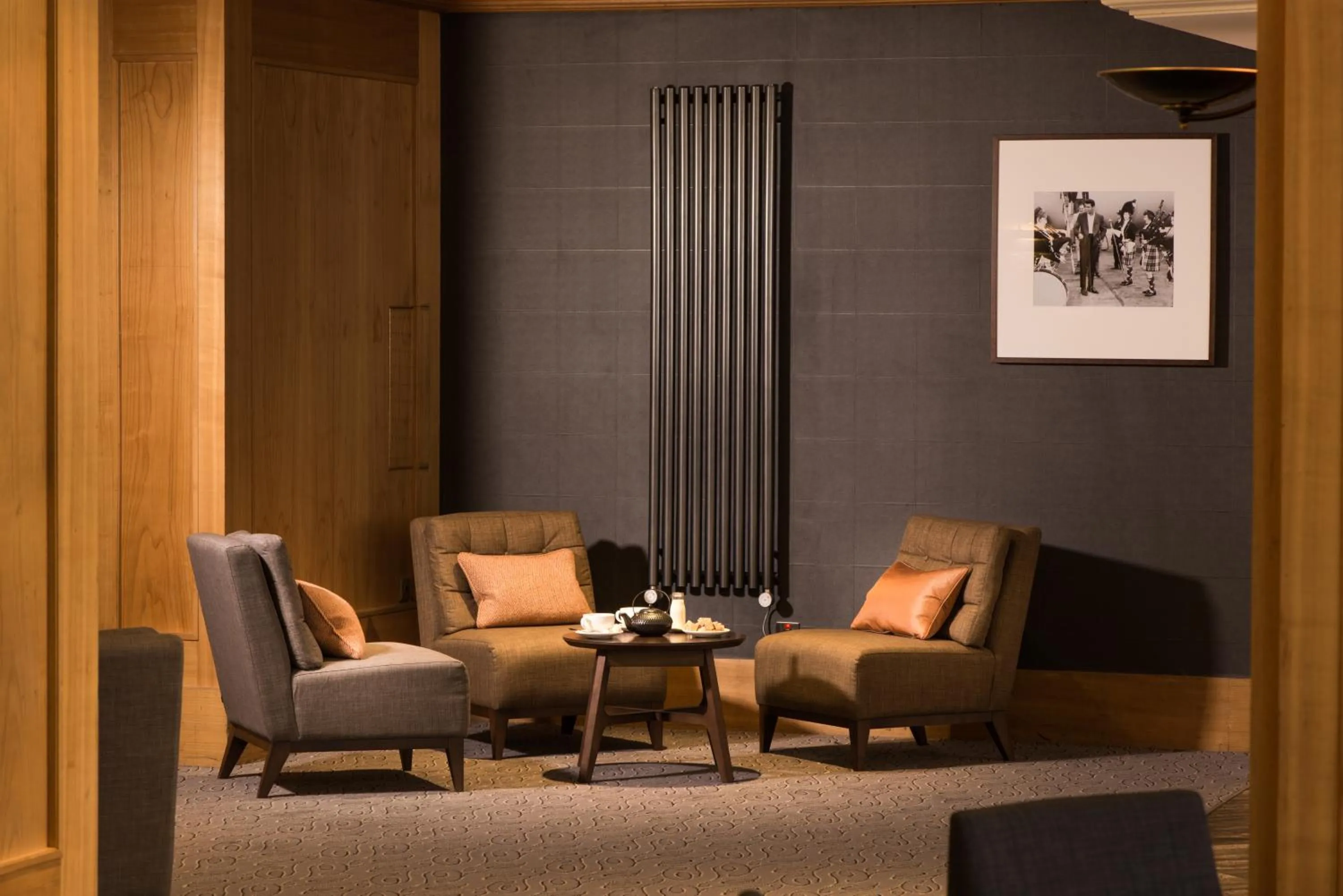 Communal lounge/ TV room in Glasgow West Hotel by Compass Hospitality