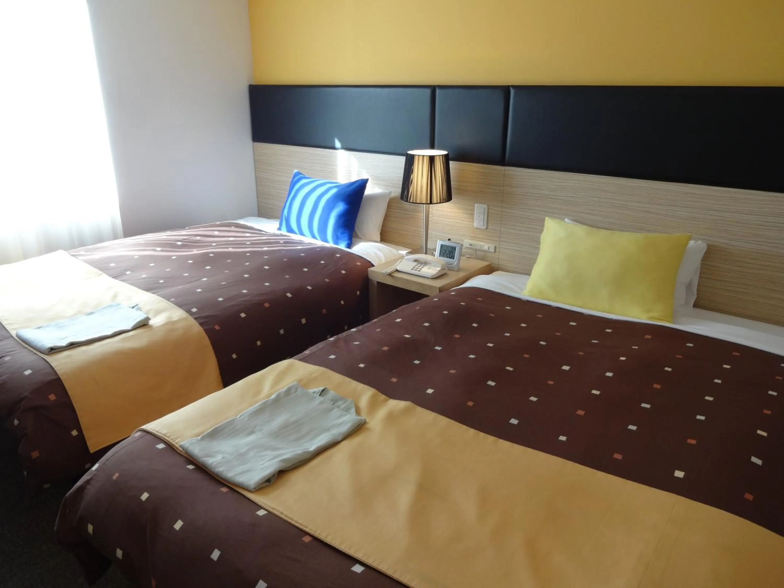 Bed in Hotel 1-2-3 Takasaki