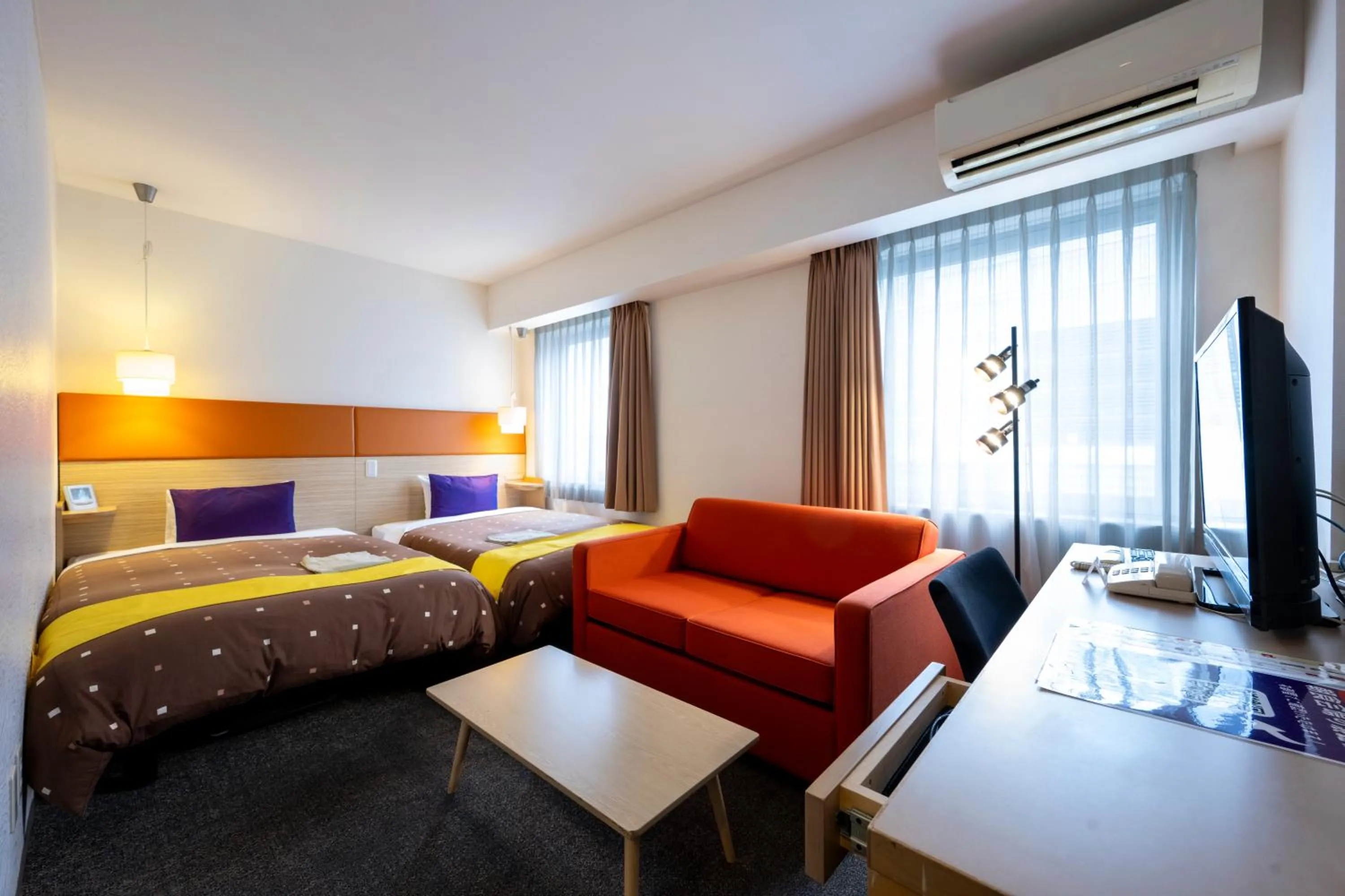 Bed in Hotel 1-2-3 Takasaki