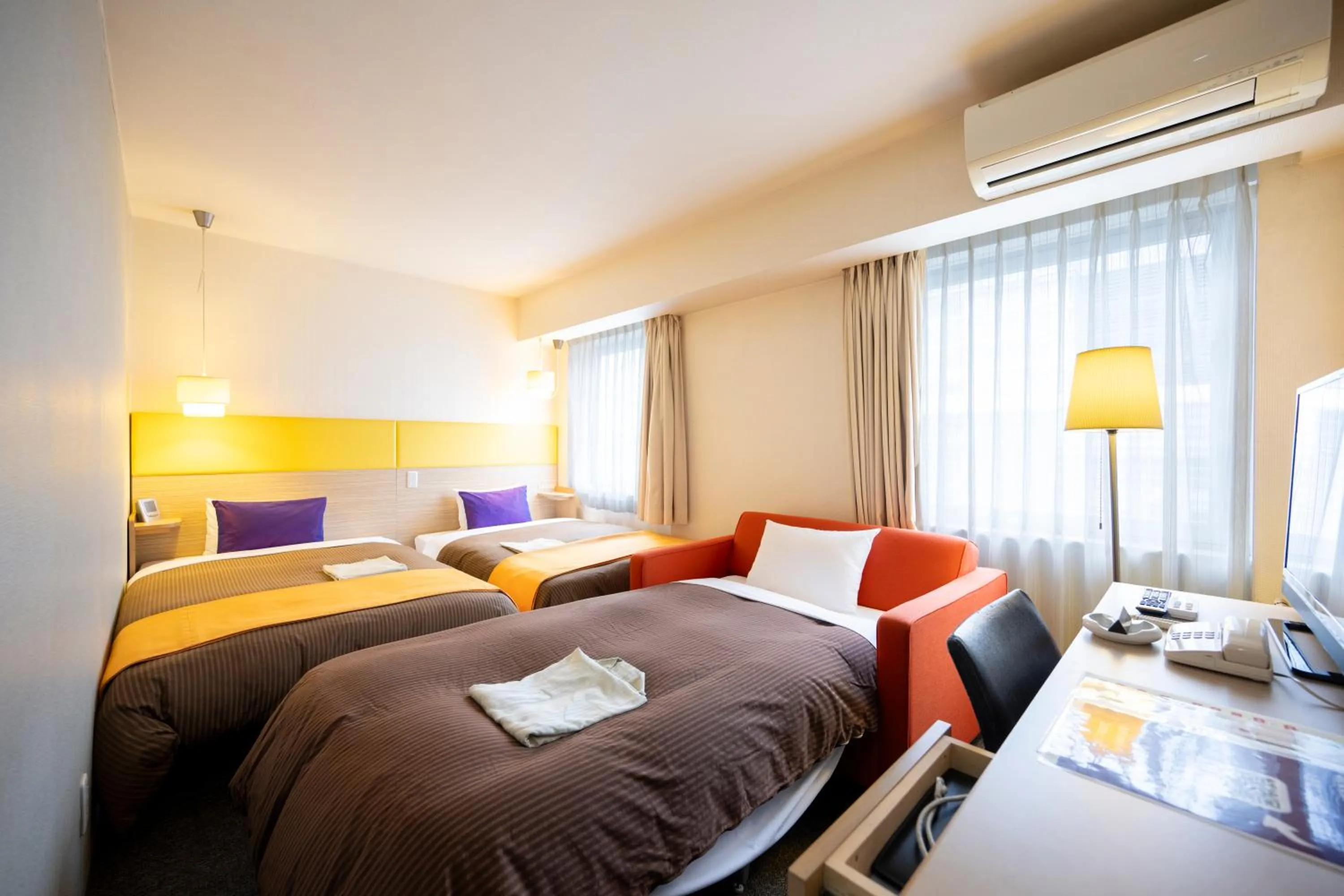 Bed in Hotel 1-2-3 Takasaki