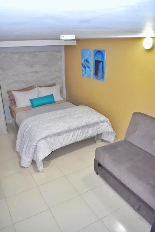 Bed in Hotel Corazón Mexicano