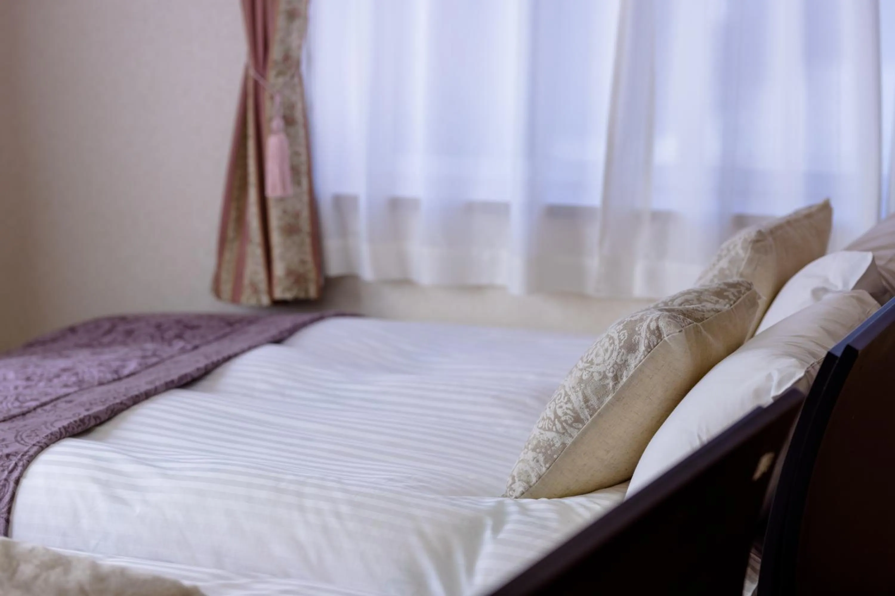 Bed in Ma Maison Mt. Fuji Kawaguchiko