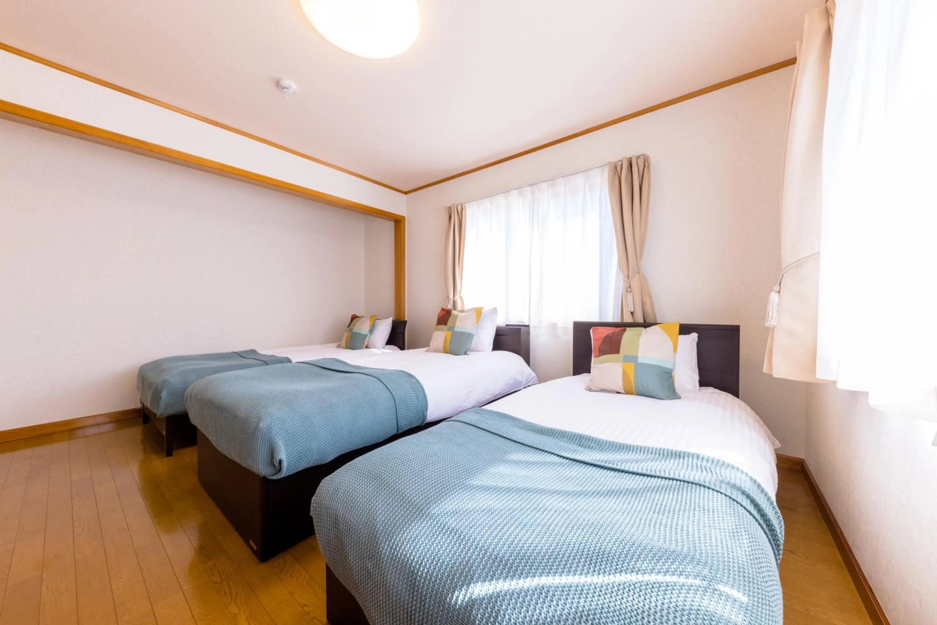 Bed in Ma Maison Mt. Fuji Kawaguchiko