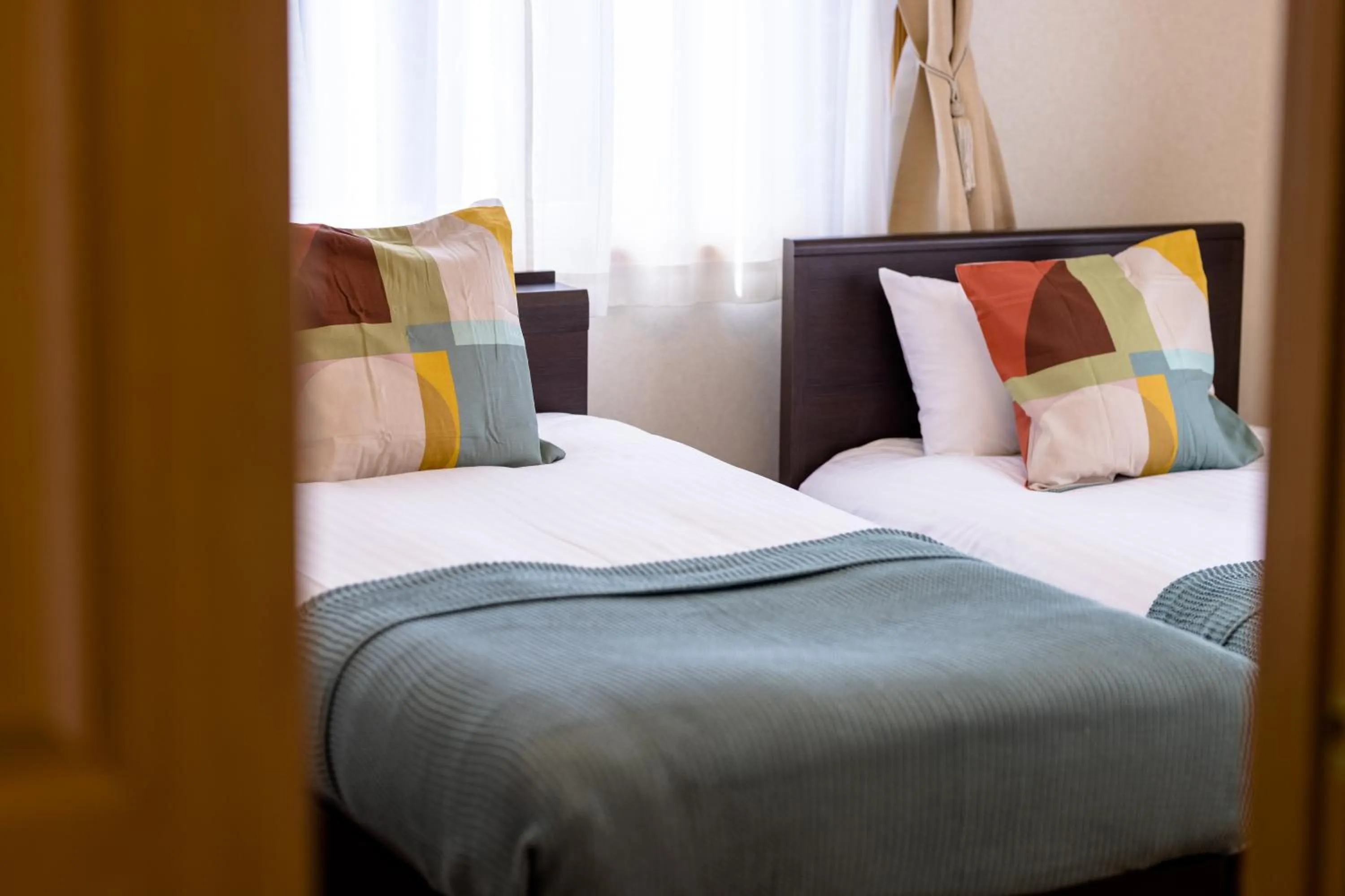 Bed in Ma Maison Mt. Fuji Kawaguchiko