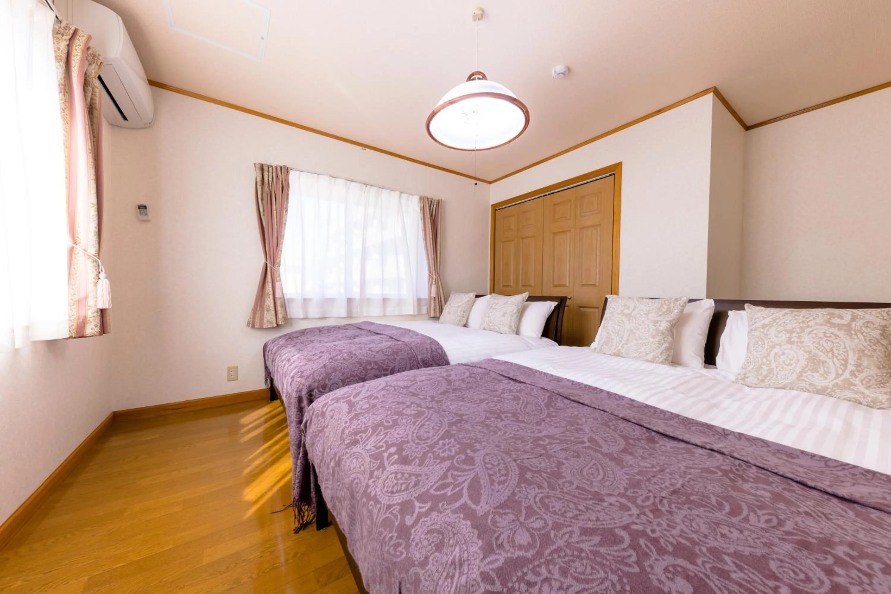 Bed in Ma Maison Mt. Fuji Kawaguchiko