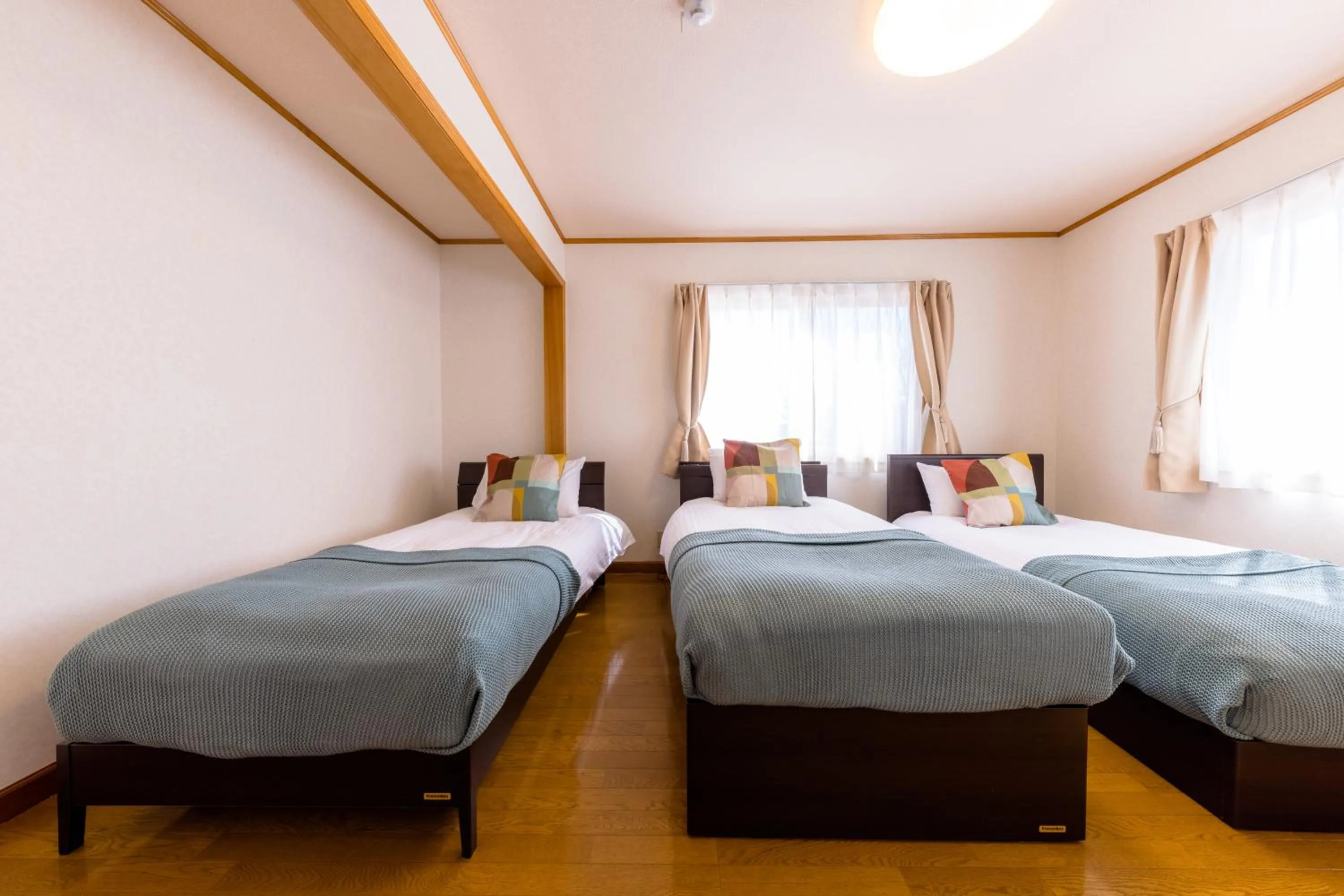 Bed in Ma Maison Mt. Fuji Kawaguchiko