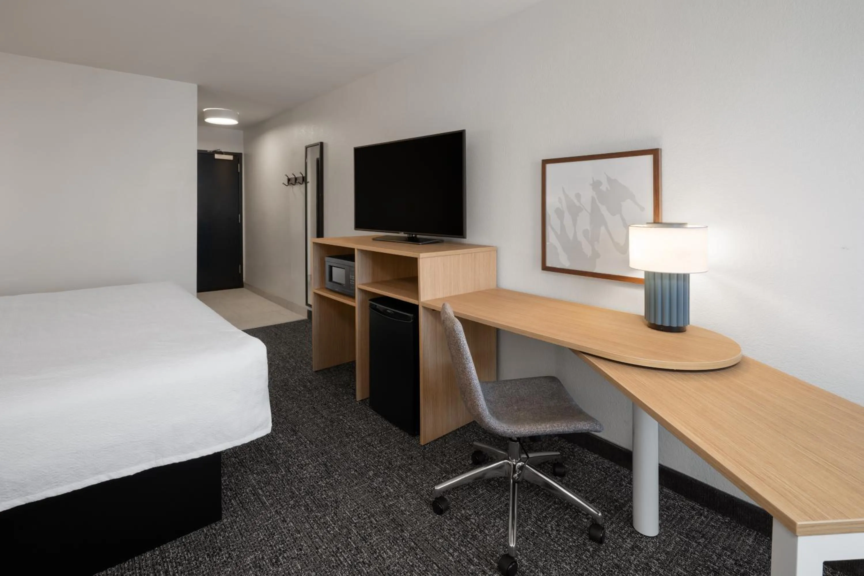 Photo of the whole room, Bed in Spark by Hilton Decatur