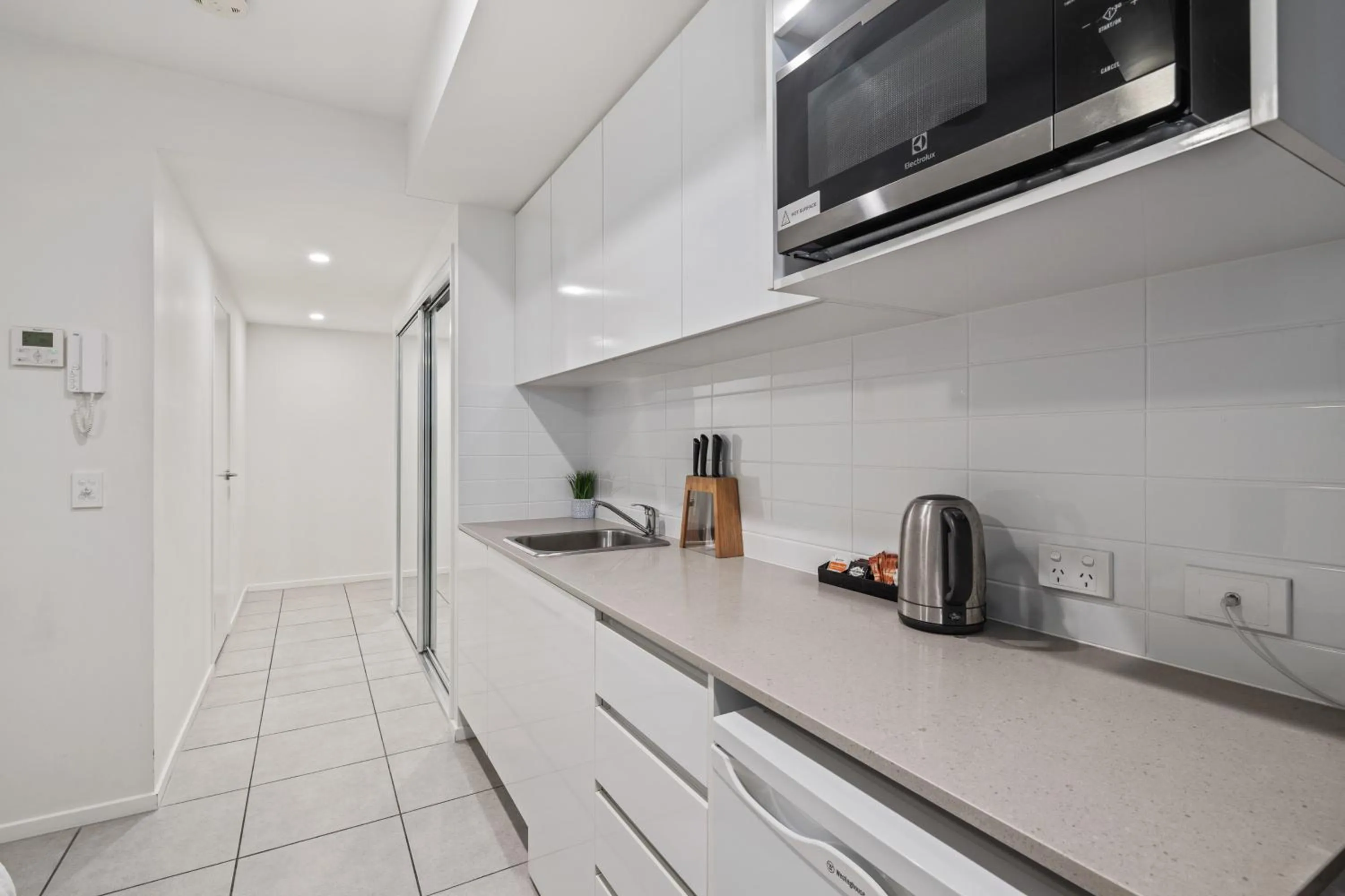 Kitchen or kitchenette in North Shore Oceanside Kawana