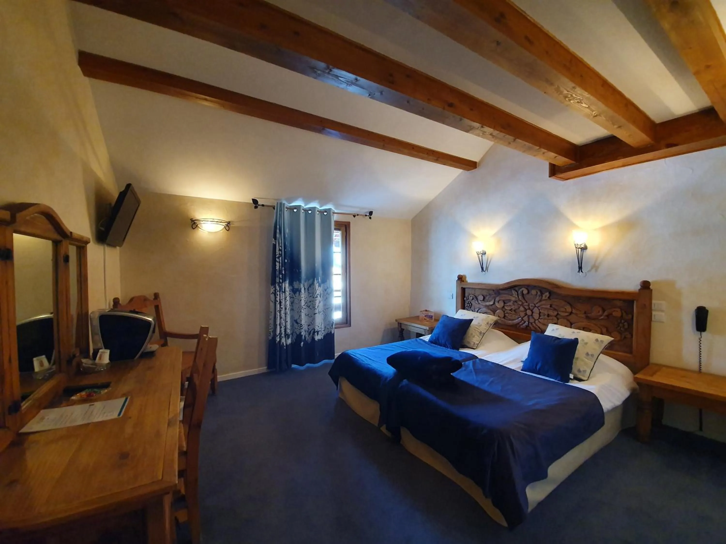 Bed in Le Chalet Suisse