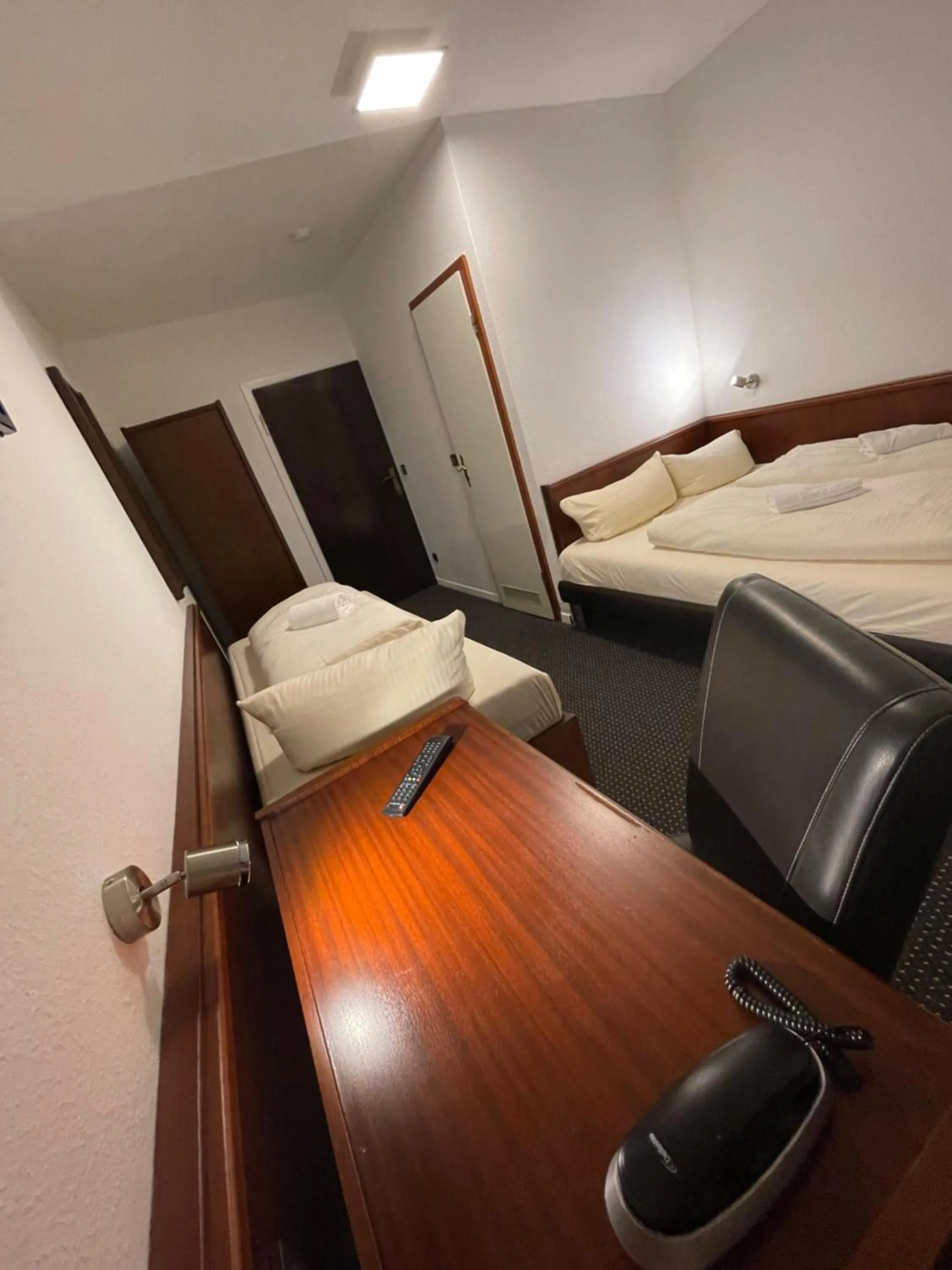 Photo of the whole room, Bed in Brunnen Hotel