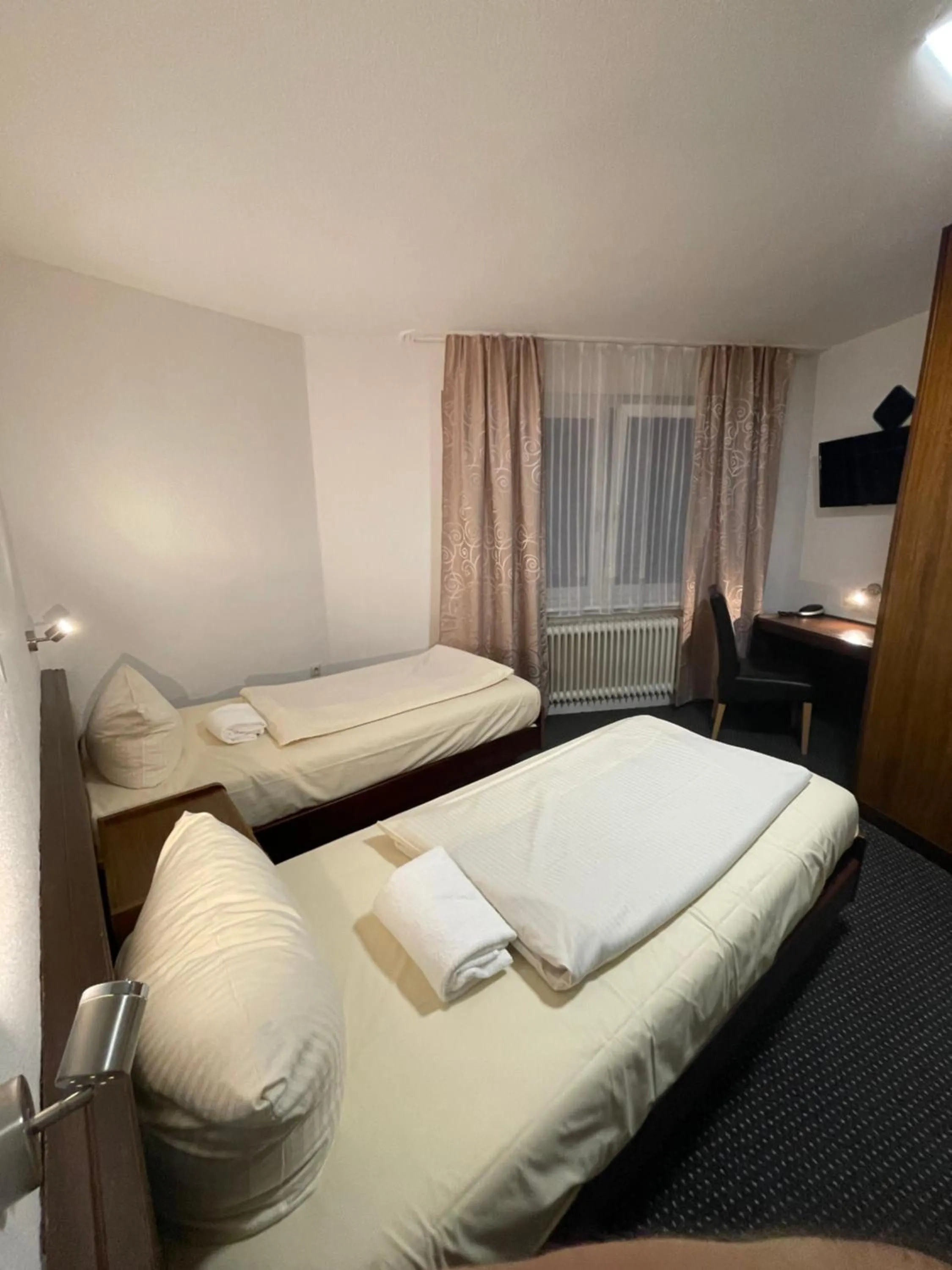 Bed in Brunnen Hotel