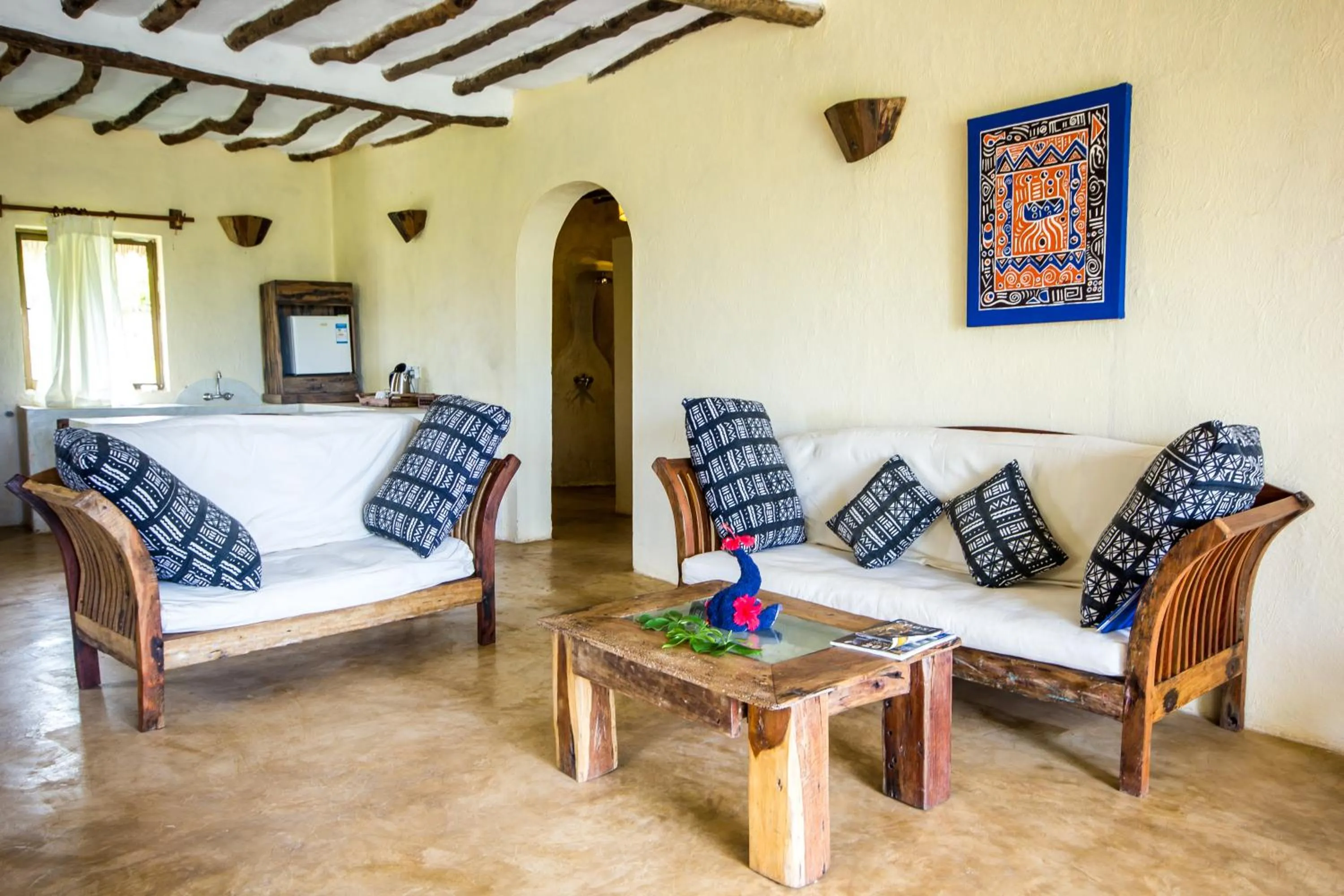 Living room, Bed in The Zanzibari