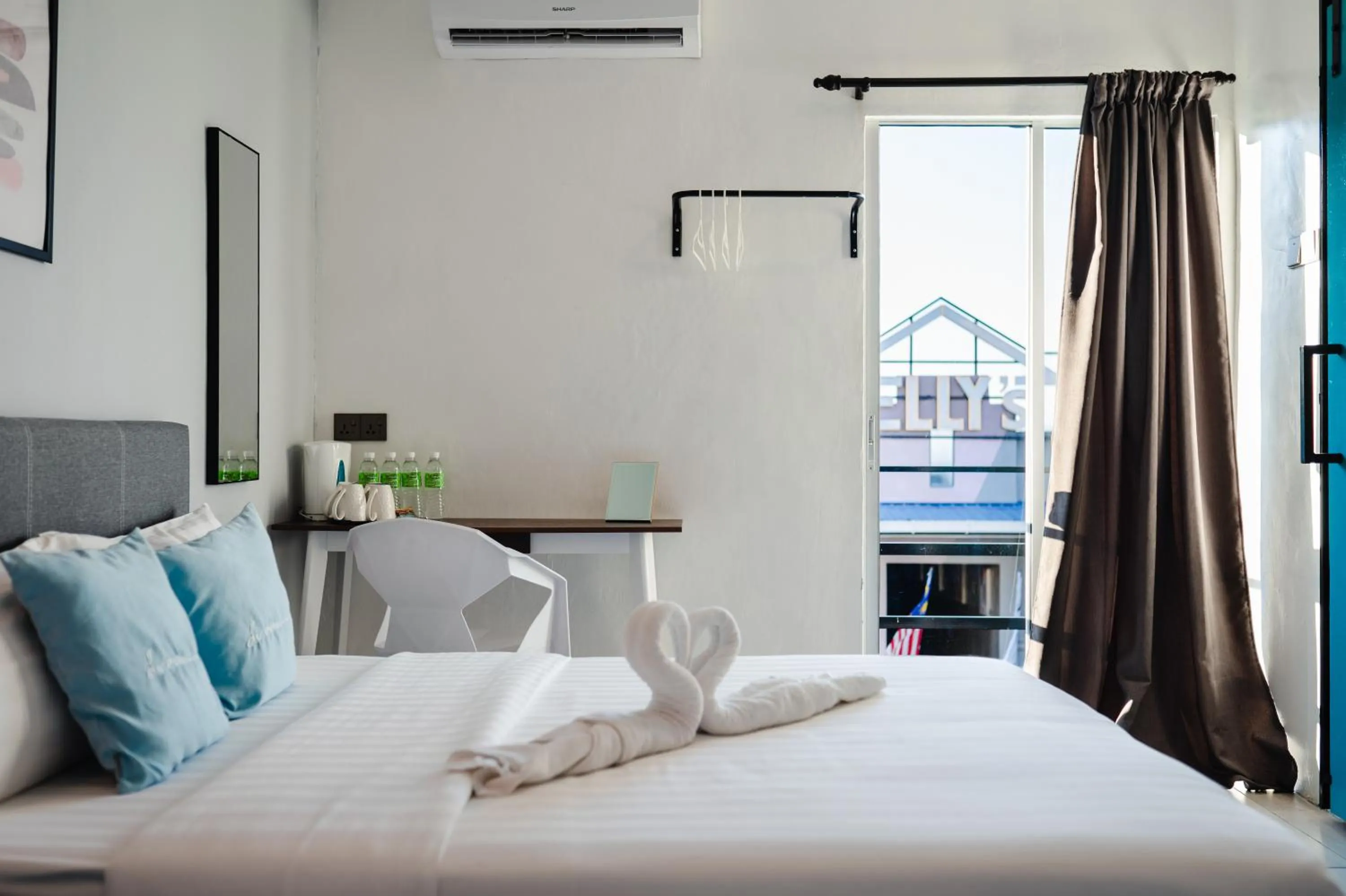 Seating area, Bed in Perfect Hub Semporna