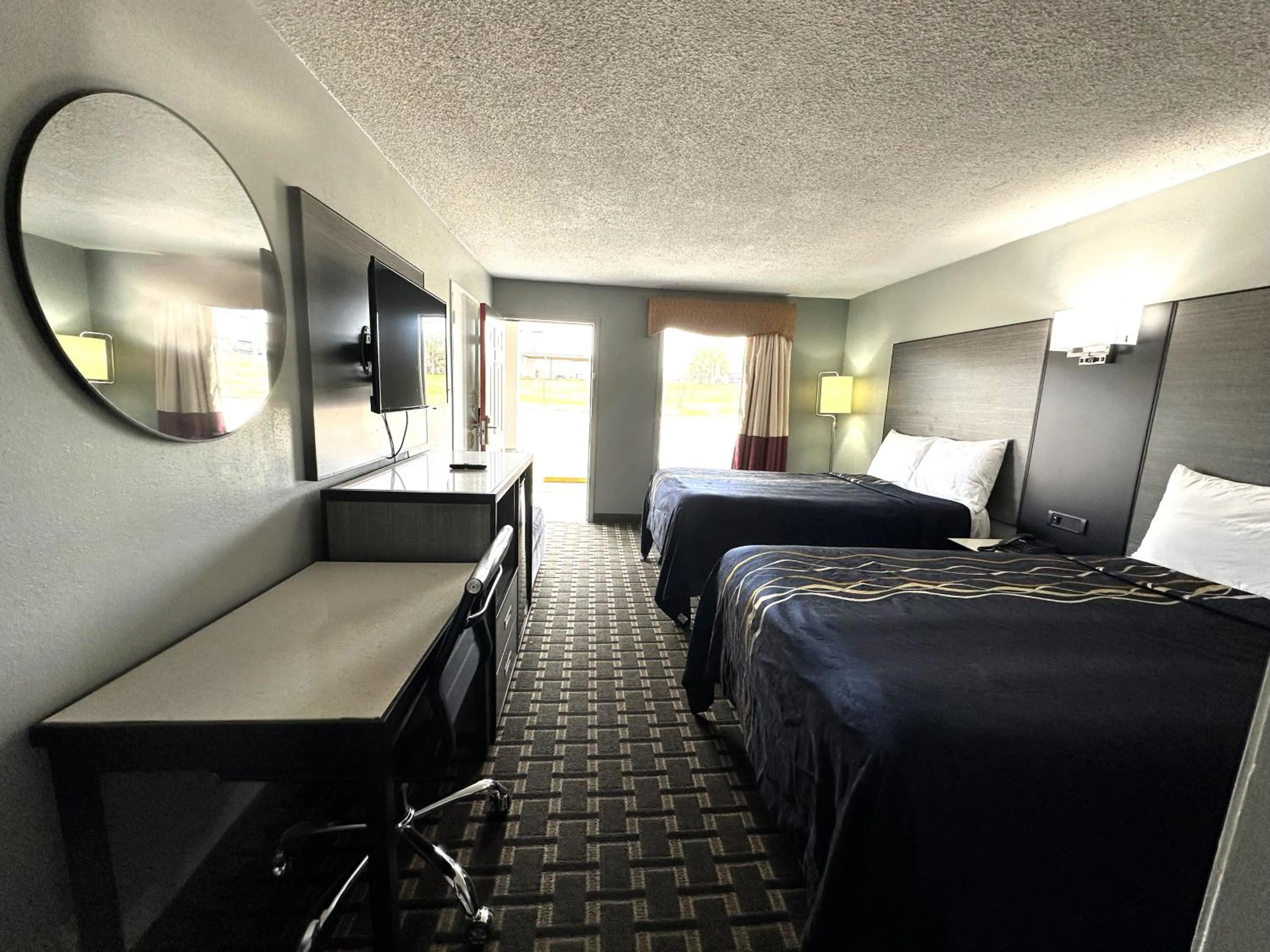 Bed in Red Carpet Inn - Natchez