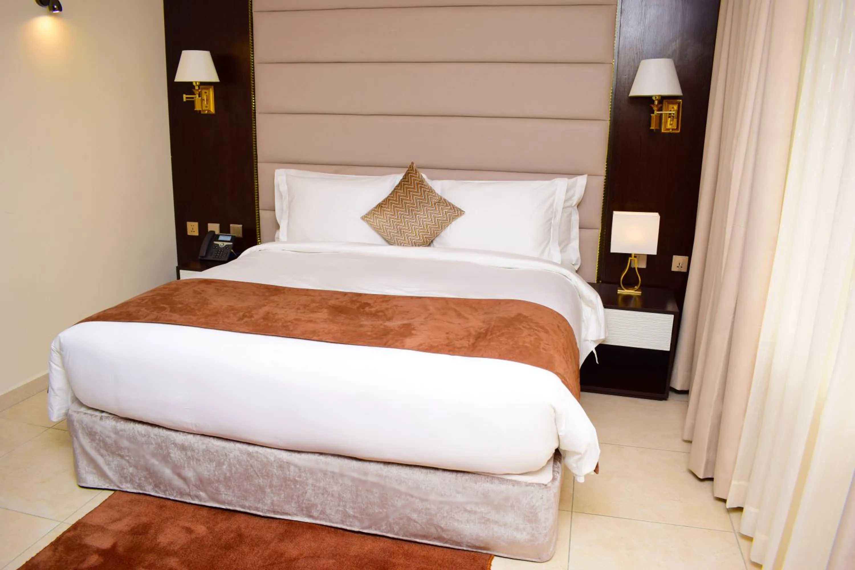 Bed in Monty Suites & Golf