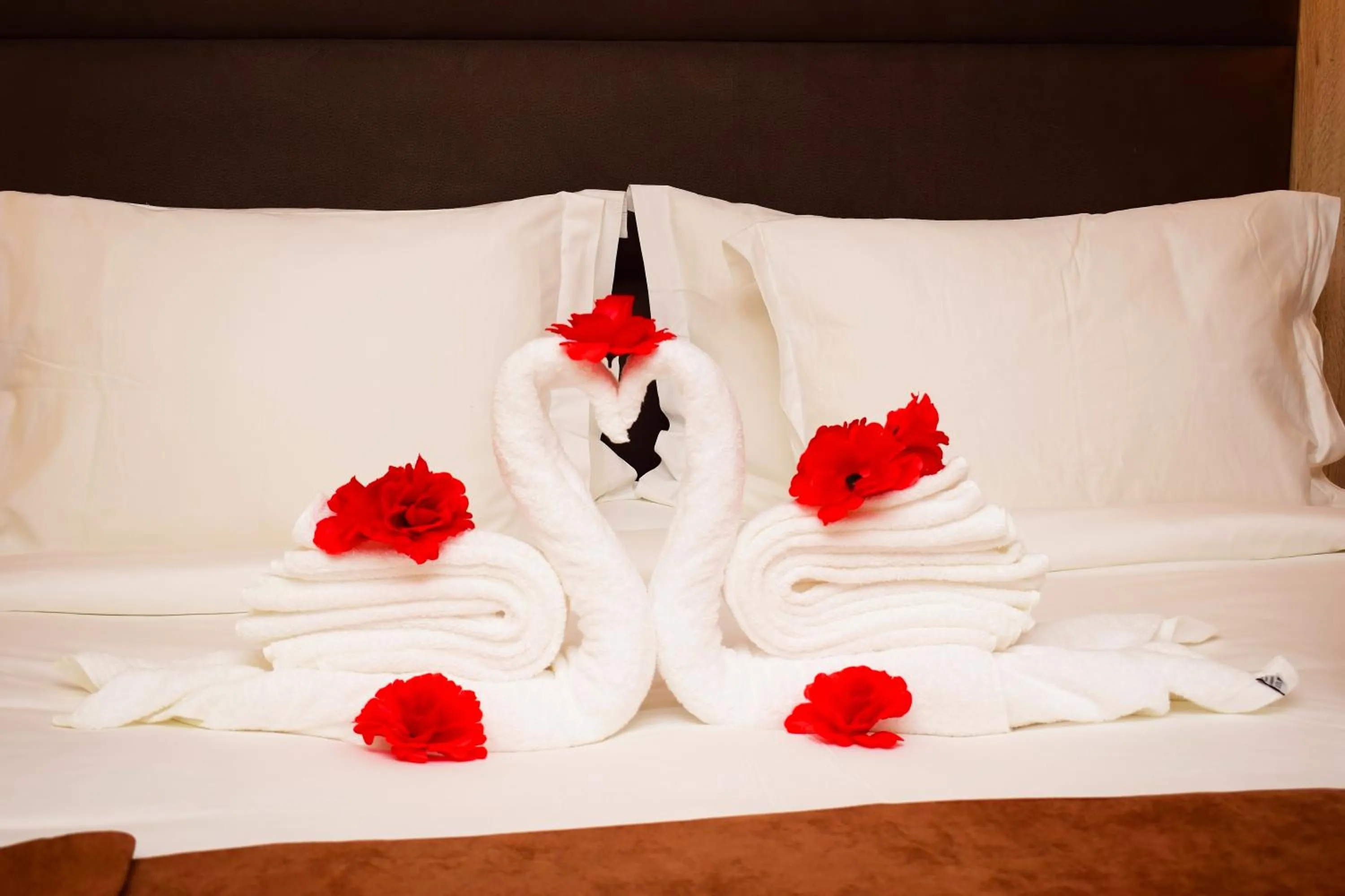 Bed in Monty Suites & Golf