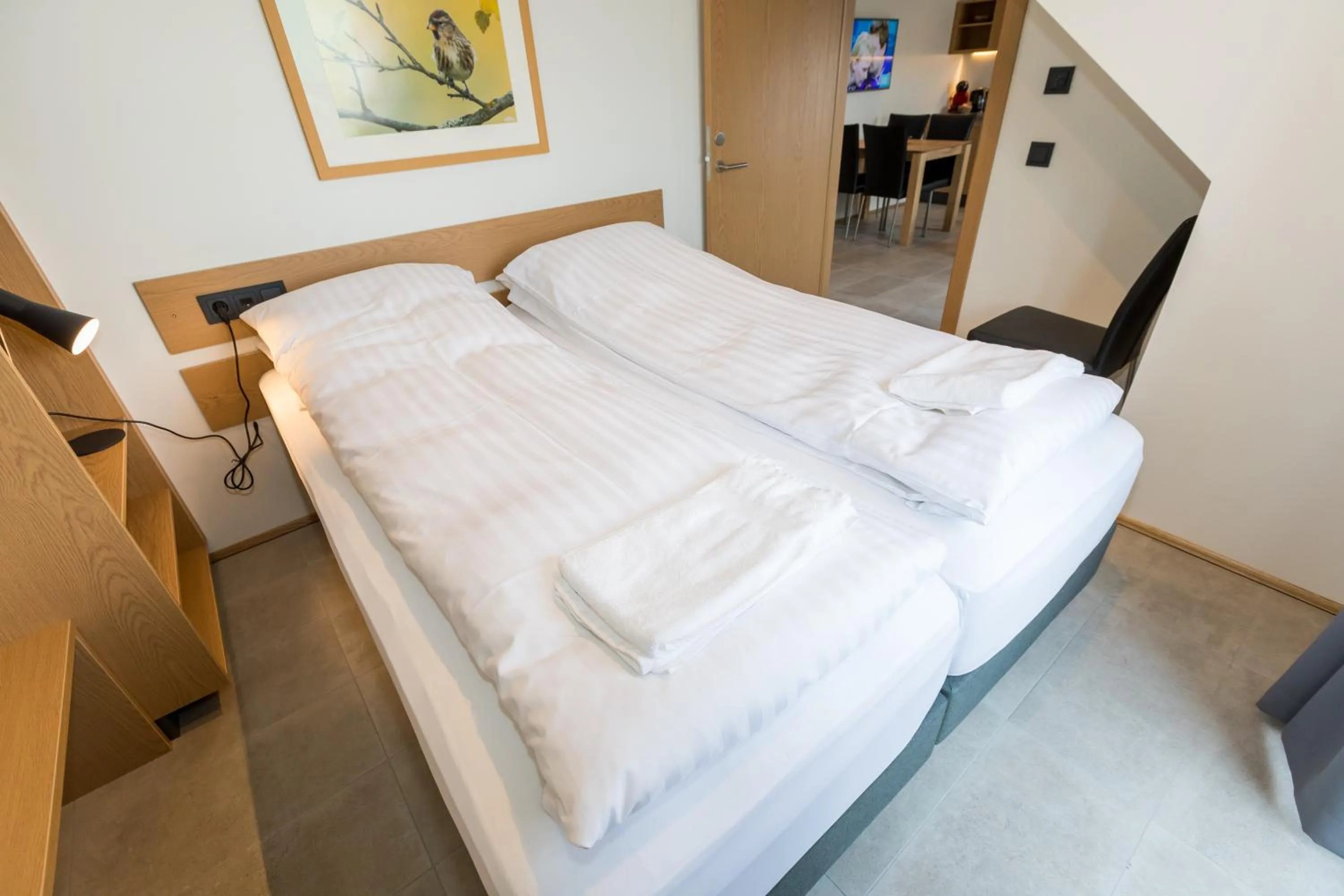 Bed in Hrimland Apartments