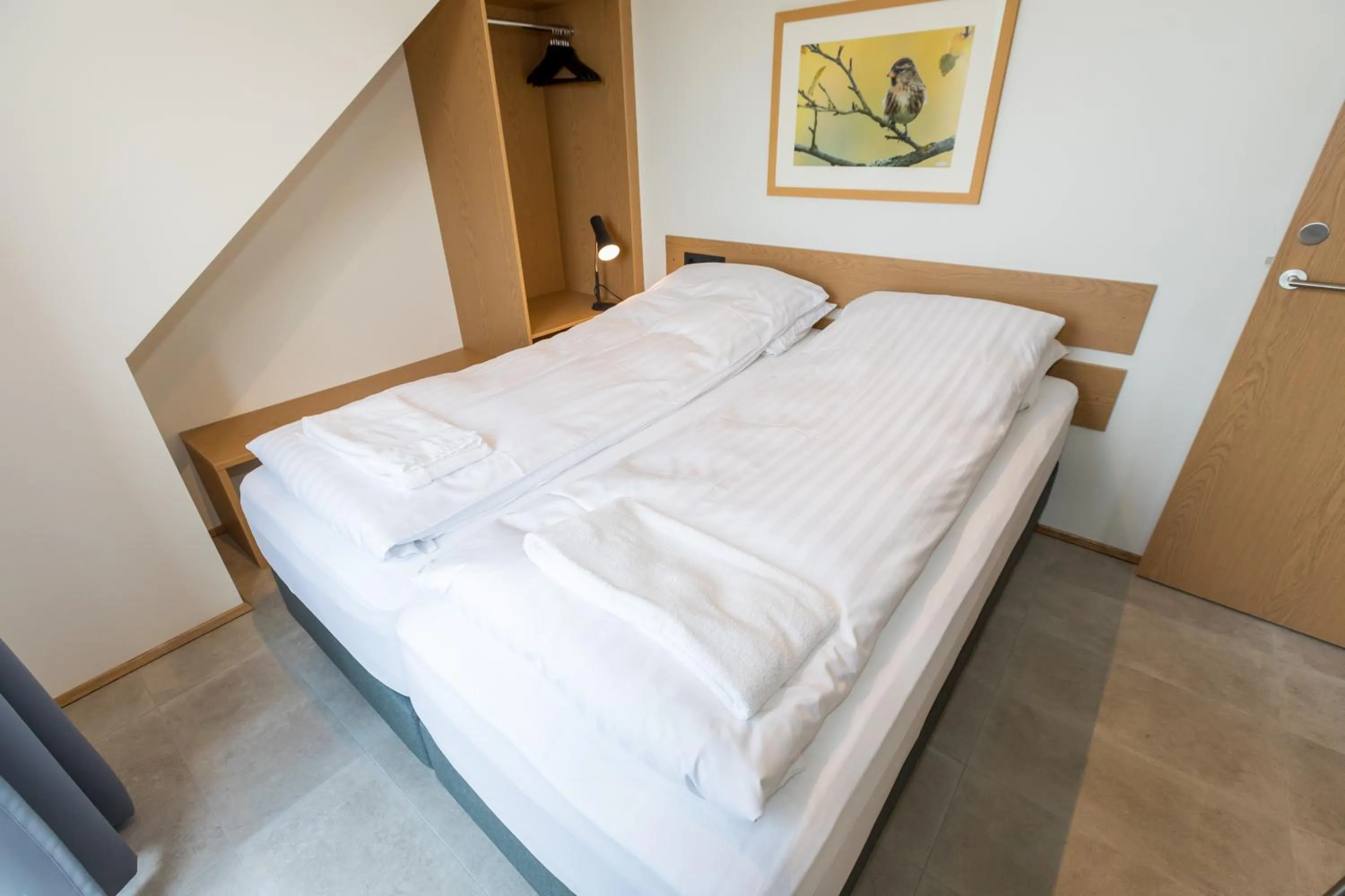 Bed in Hrimland Apartments
